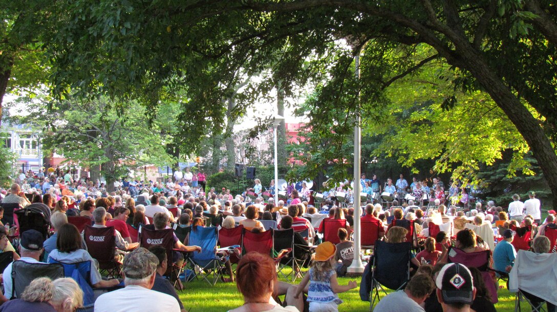 Visitors enjoy a free concert in Lower Canal Park at the Soo Locks.  Concerts are held Wednesday evenings during the summer.