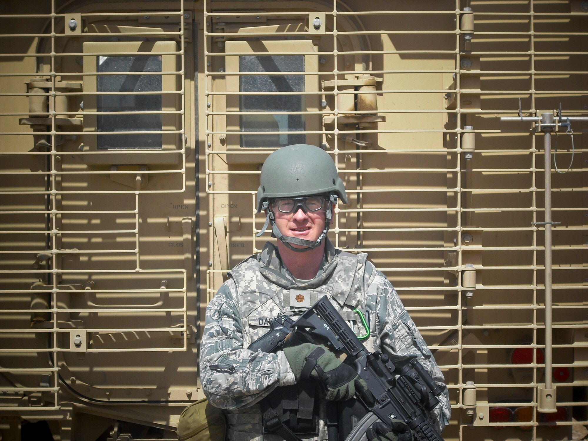 Lt. Col. Ed Dagney, 177th Comptroller Flight Commander, poses in front of a Mine Resistant Anti-Personnel (MRAP) vehicle in Afghanistan.  Courtesy photo. 
