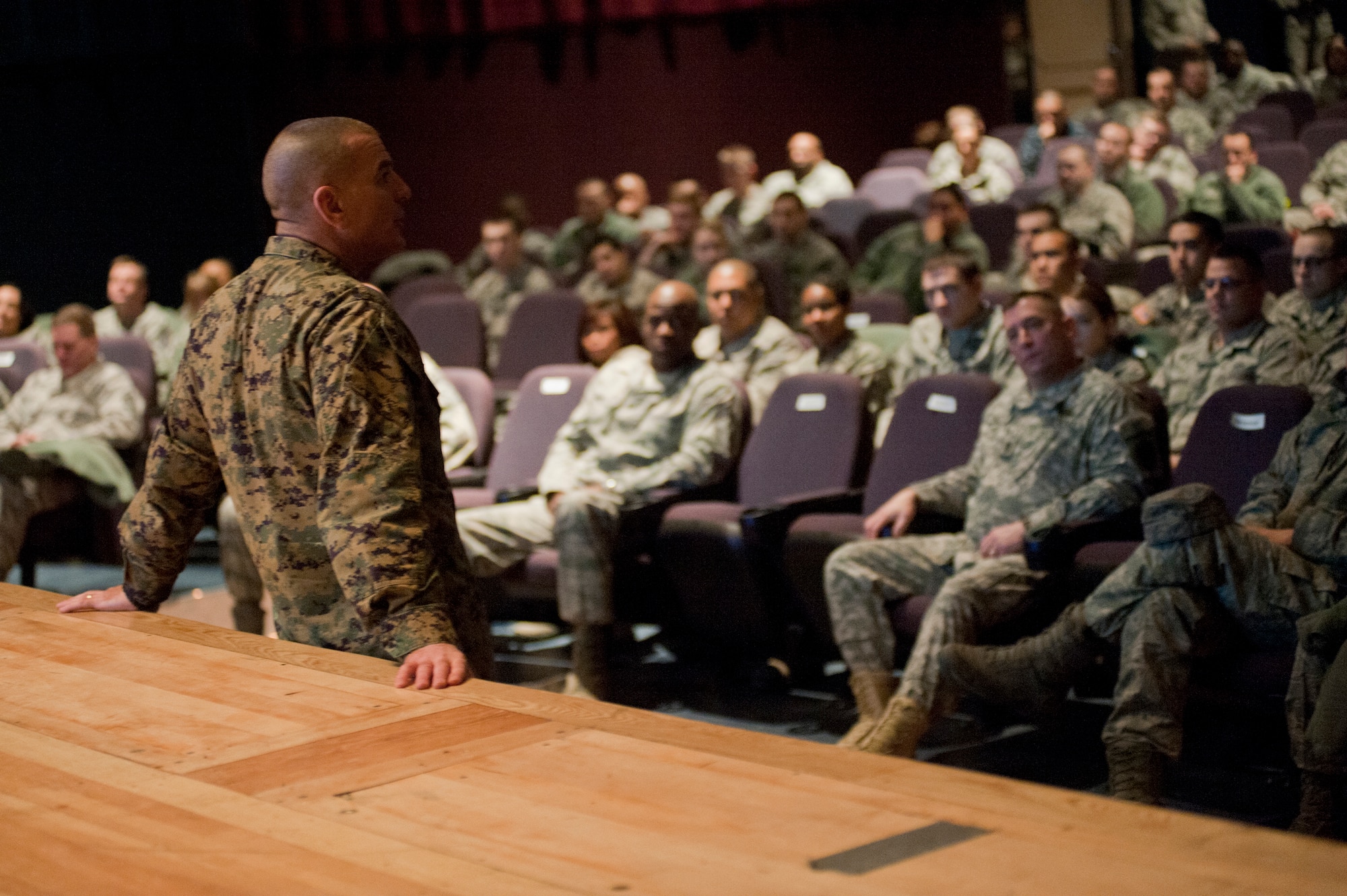 JOINT BASE ELMENDORF-RICHARDSON, Alaska -- The Senior Enlisted Advisor to the Chairman of the Joint Chiefs of Staff, Marine Sgt. Maj. Bryan Battaglia, speaks to Soldiers, Airmen, Sailors and Marines during his visit to JBER Feb. 1. The sergeant major toured the installation and provided insight on the bigger military picture. Battaglia became SEAC Oct. 1, 2011 and is the second to serve in the position. The SEAC is a military position within the U.S. Department of Defense and is designated the senior NCO in the United States armed forces, appointed by the Chairman of the Joint Chiefs of Staff. (U.S. Air Force photo/Staff Sgt. Robert Barnett)
