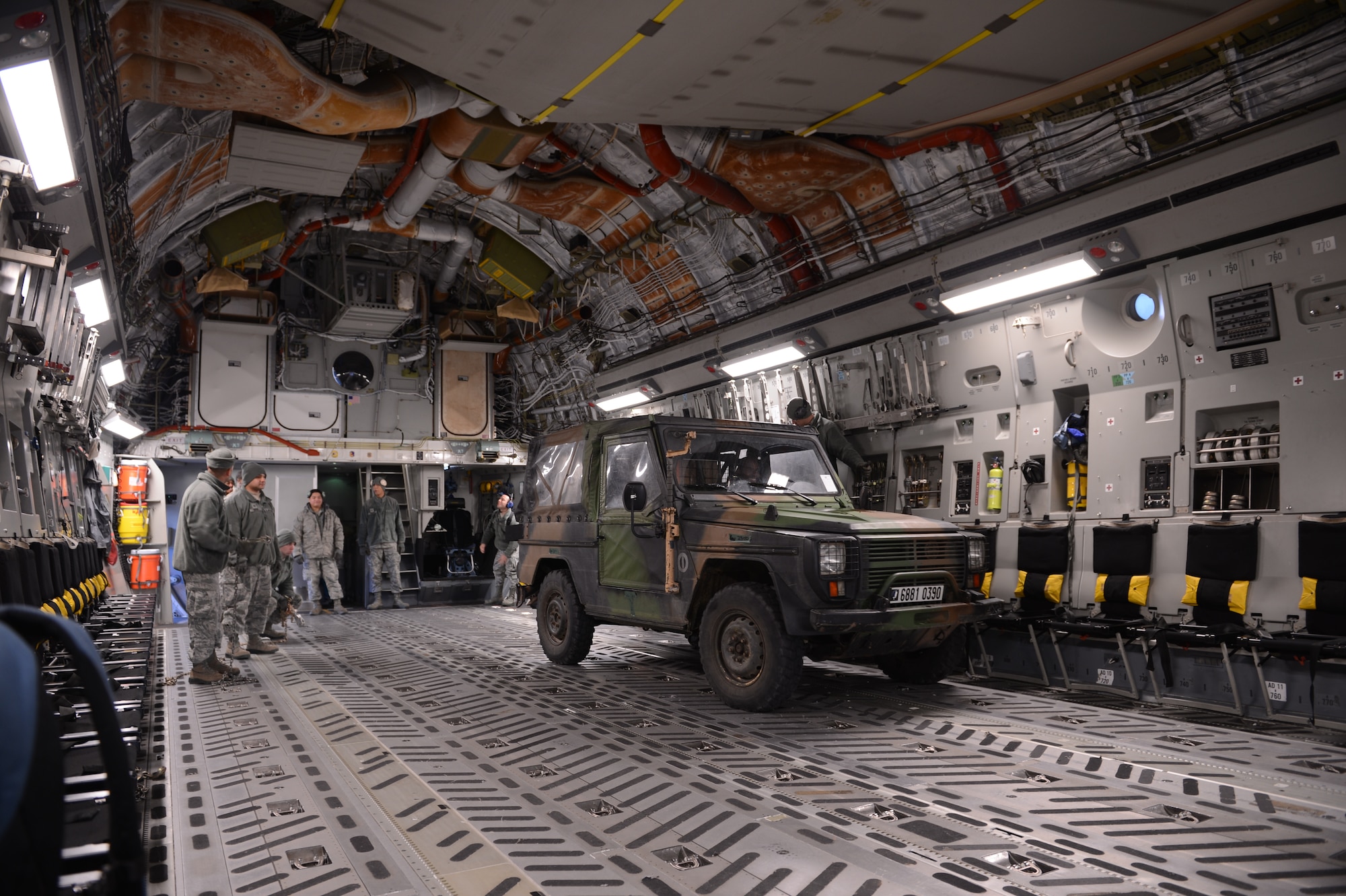 A French military vehicle is secured inside a U.S. Air Force C-17 Globemaster III cargo aircraft in Istres, France.  The United States has agreed to help France airlift troops and equipment into Mali. (U.S. Air Force photo by Staff Sgt. Nathanael Callon) (Released)
