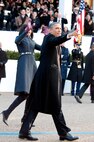 President Barrack Obama walks beside the first lady, Michelle Obama, during the 57th Presidential Inauguration parade in Washington, D.C., Jan. 21, 2013. More than 6,000 National Guard members joined local and federal law enforcement to ensure the President was kept safe during Inauguration activities. (Air National Guard photo by Senior Airman Andrea F. Liechti)