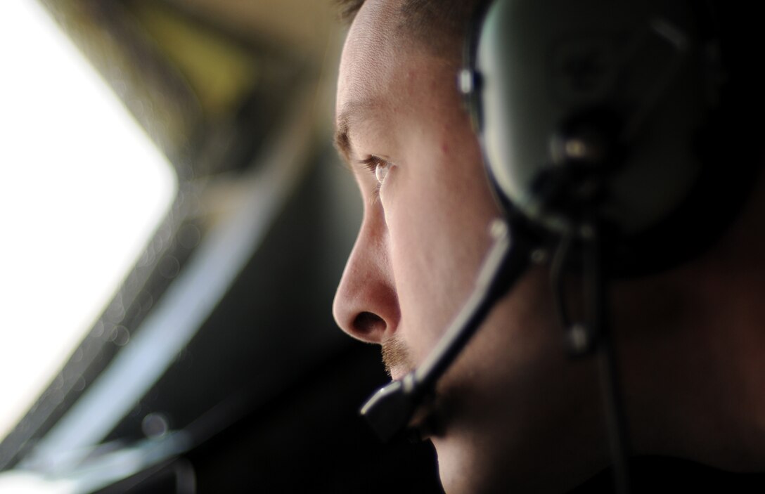 Staff Sgt. Andrew Valence, 351st Expeditionary Air Refueling Squadron boom operator, watches out the rear window of a KC-135 Stratotanker as a French Mirage 2000 refuels over Africa Feb. 2, 2013. Tanker crews from the 100th Air Refueling Wing, RAF Mildenhall, England, began conducting refueling missions in support of French operations in Mali from a deployed location in southwest Europe Jan 27. (U.S. Air Force photo by Staff Sgt. Austin M. May/Released)