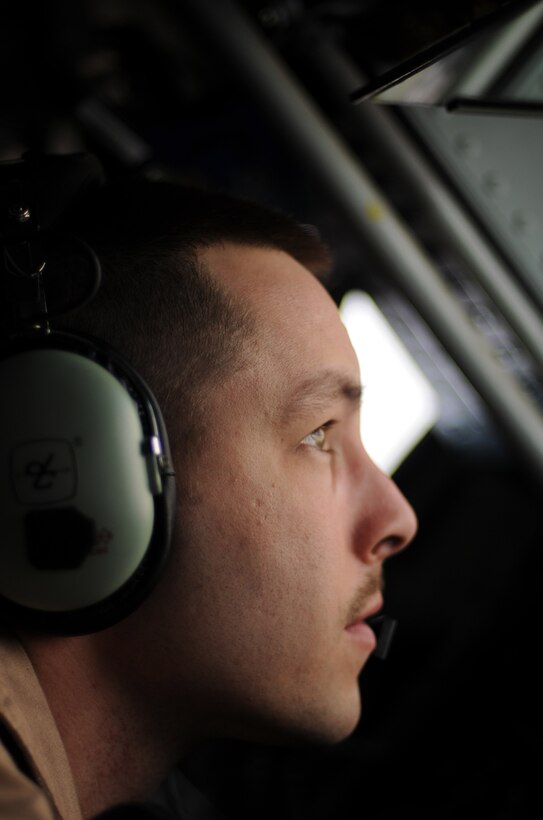 Staff Sgt. Andrew Valence, 351st Expeditionary Air Refueling Squadron boom operator, watches out the rear window of a KC-135 Stratotanker as a French Mirage 2000 refuels over Africa Feb. 2, 2013. Tanker crews from the 100th Air Refueling Wing, RAF Mildenhall, England, began conducting refueling missions in support of French operations in Mali from a deployed location in southwest Europe Jan 27. (U.S. Air Force photo by Staff Sgt. Austin M. May/Released)