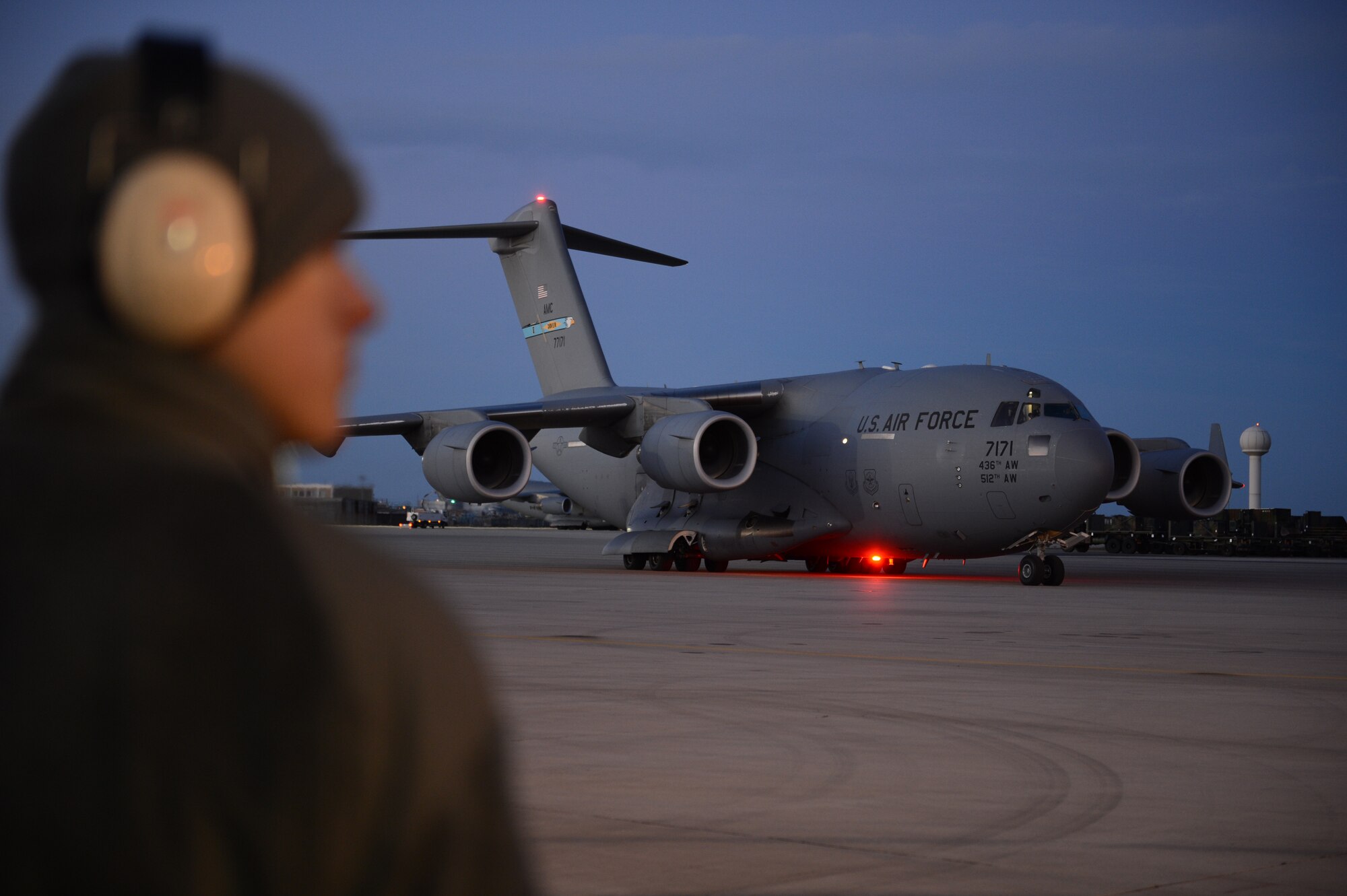 ISTRES, France – A U.S. Airman from the 621st Contingency Response Wing looks on as a U.S. Air Force C-17 Globemaster III cargo aircraft taxis onto a loading ramp in Istres, France, Jan. 22, 2013. The U.S. pledged support to the French military for their operations in Mali, and provided C-17s and Airmen for logistical support. (U.S. Air Force photo by Staff Sgt. Nathanael Callon/Released)