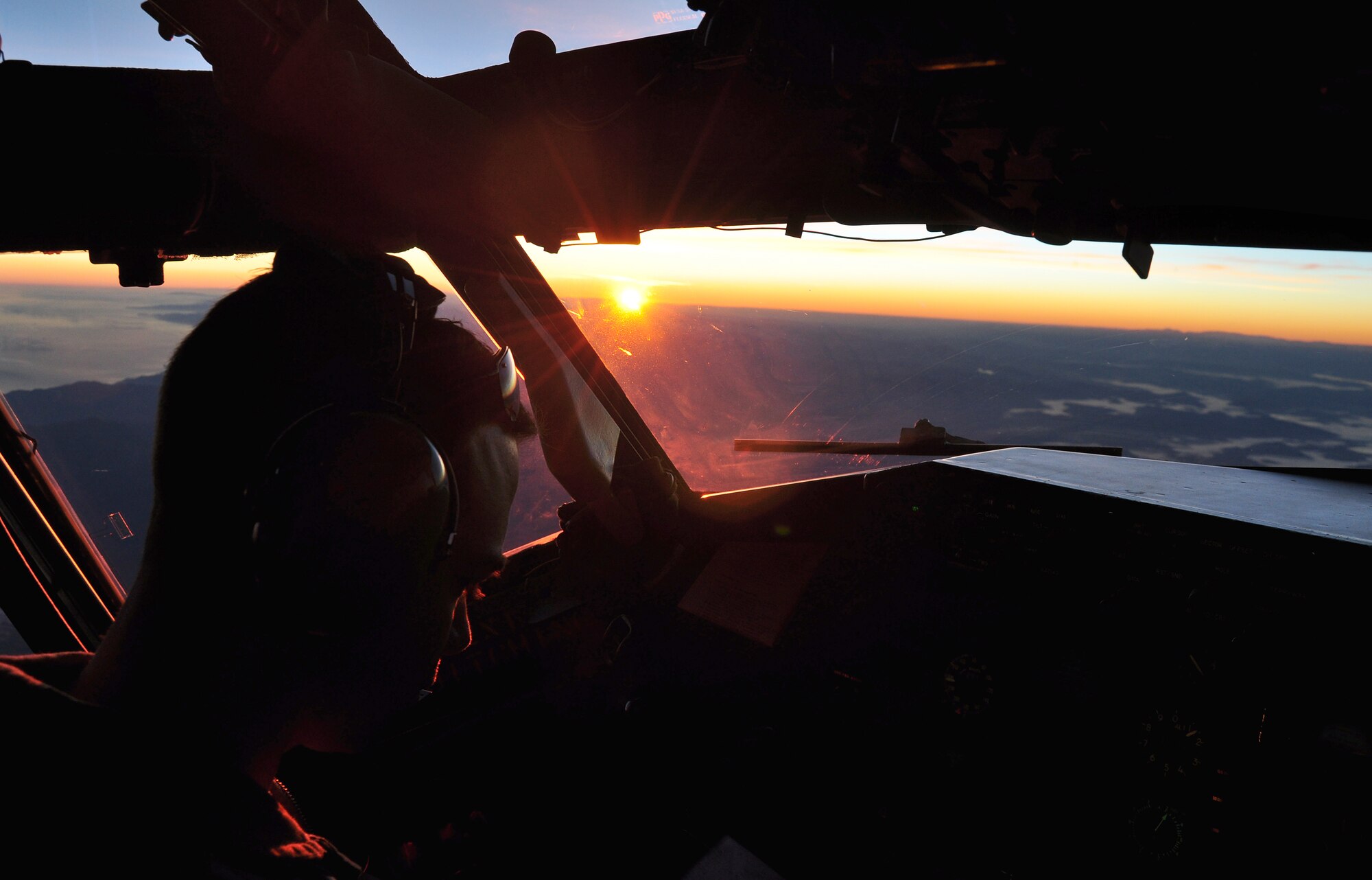 Capt. Tim Gerne, 100th Air Refueling Wing Detachment pilot deployed to a forward operating location, flies a KC-135 Stratotanker over Africa as the sun rises on Jan. 29, 2013. The detachment from RAF Mildenhall, England, deployed Jan. 26 to deliver air refueling support to French operations in Mali. (U.S. Air Force photo by Capt. Jason Smith)