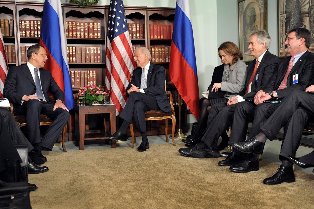 Russian Foreign Minister Sergei Lavrov and U.S. Vice President Joe Biden sit for bilateral talks with officials from both nations during the 49th Annual Munich Security Conference in Munich, Feb. 2, 2013. Seated at right is U.S. Deputy Defense Secretary Ashton B. Carter.