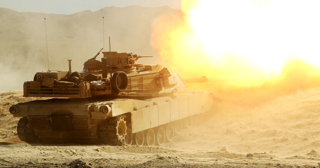 An M1A1 Abrams tank provides suppressive fire against simulated insurgents during day 12 of the Integrated Training Exercise, Jan 22, 2013.