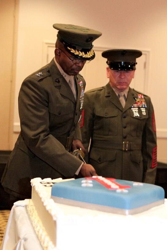 CARLSBAD, Calif. – Major General Ronald Bailey, the 1st Marine Division commanding general, cuts a birthday cake during a dinner in celebration of the 72nd anniversary of the founding of the 1st Marine Division at the Sheraton Carlsbad Resort and Spa in Carlsbad, Calif., Feb. 1, 2013. The cake featured a picture of the division logo, a blue diamond with the word Guadalcanal, a brutal and decisive battle during World War II where the Division served with distinction. The five white stars represent the Southern Cross constellation overhead during the battle.
(U.S. Marine Corps photo by Sgt. Jacob H. Harrer)