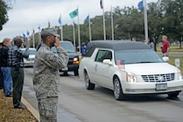 Members of Joint Base San Antonio-Randolph community, lined the streets to pay their respects to Sgt. Mark Schoonhoven Feb. 4. Sgt. Shoonhoven, 38,  who was assigned to the 32nd Transportation Company, 157th Combat Sustainment Support Battalion died Jan. 20 2013 from injuries sustained from an improvised explosive device  explosion in December 2012 while serving in Afghanistan. (U.S. Air Force photo by 
Benjamin Faske) (released)