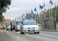 Members of Joint Base San Antonio-Randolph community, lined the streets to pay their respects to Sgt. Mark Schoonhoven Feb. 4. Sgt. Shoonhoven, 38,  who was assigned to the 32nd Transportation Company, 157th Combat Sustainment Support Battalion died Jan. 20 2013 from injuries sustained from an improvised explosive device  explosion in December 2012 while serving in Afghanistan. (U.S. Air Force photo by 
Benjamin Faske) (released)