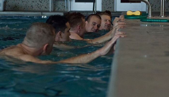 Soldiers from the Community Based Warrior Transition Unit participate in an aquatics instruction class at the Warrior Fitness Center Jan. 28 at Nellis Air Force Base.  The CBWTU is a program designed to assist Soldiers transitioning back to duty or to civilian life by providing physical, emotional and cognitive health care.  This muster is held annually for each of the four states they support, one of which is Nevada. ( U.S. Air Force photo by Airman 1st Class Monet Villacorte)