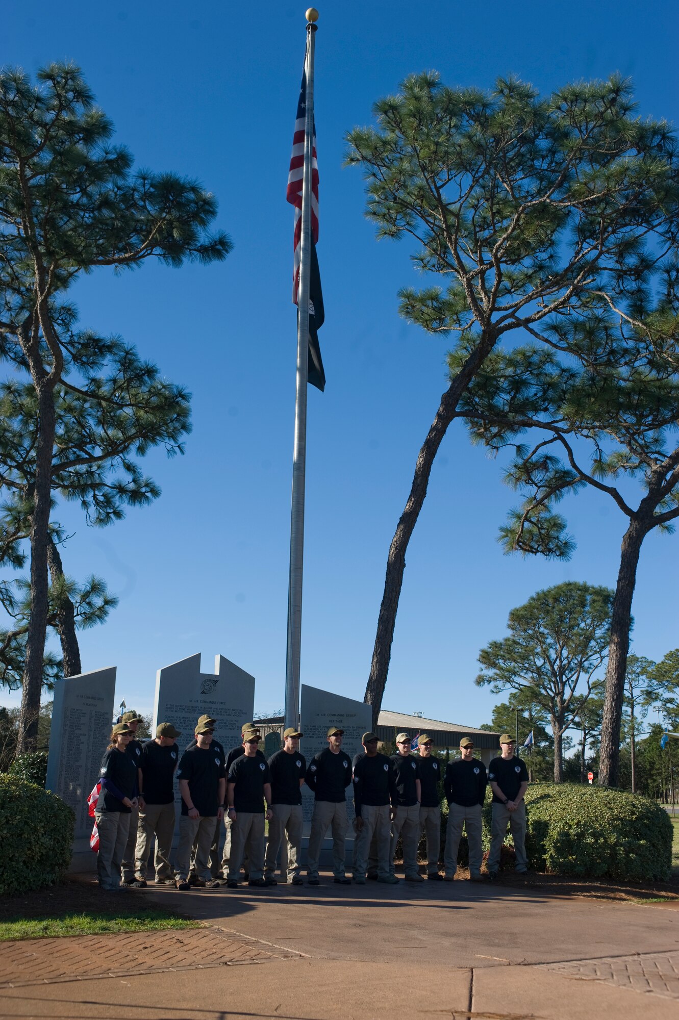 Sixteen Air Commandos from Hurlburt Field pose for a group photo before embarking on their 450-mile march to honor fallen Air Commandos at the Airpark at Hurlburt Field, Fla., Feb. 3, 2013. The five-day march will take the Airmen from Hurlburt Field to MacDill Air Force Base in Tampa, Fla. (U.S. Air Force Photo/Airman 1st Class Hayden K. Hyatt)
