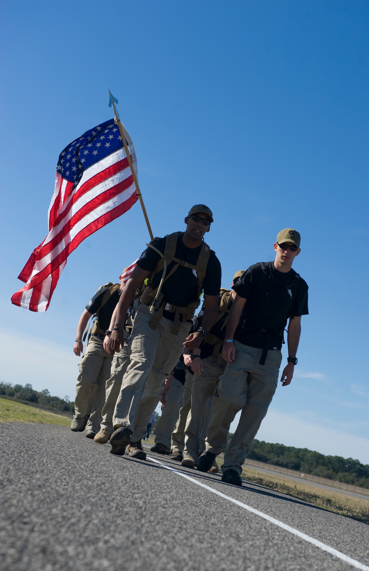 Air Commandos from Hurlburt Field forge ahead during the 2nd Annual Air Commando Ruck and Climb at Hurlburt Field, Fla., Feb. 3, 2013. The 450-mile march will take the 16 Airmen from Hurlburt Field to MacDill Air Force Base in Tampa, Fla. (U.S. Air Force Photo/Airman 1st Class Hayden K. Hyatt)  