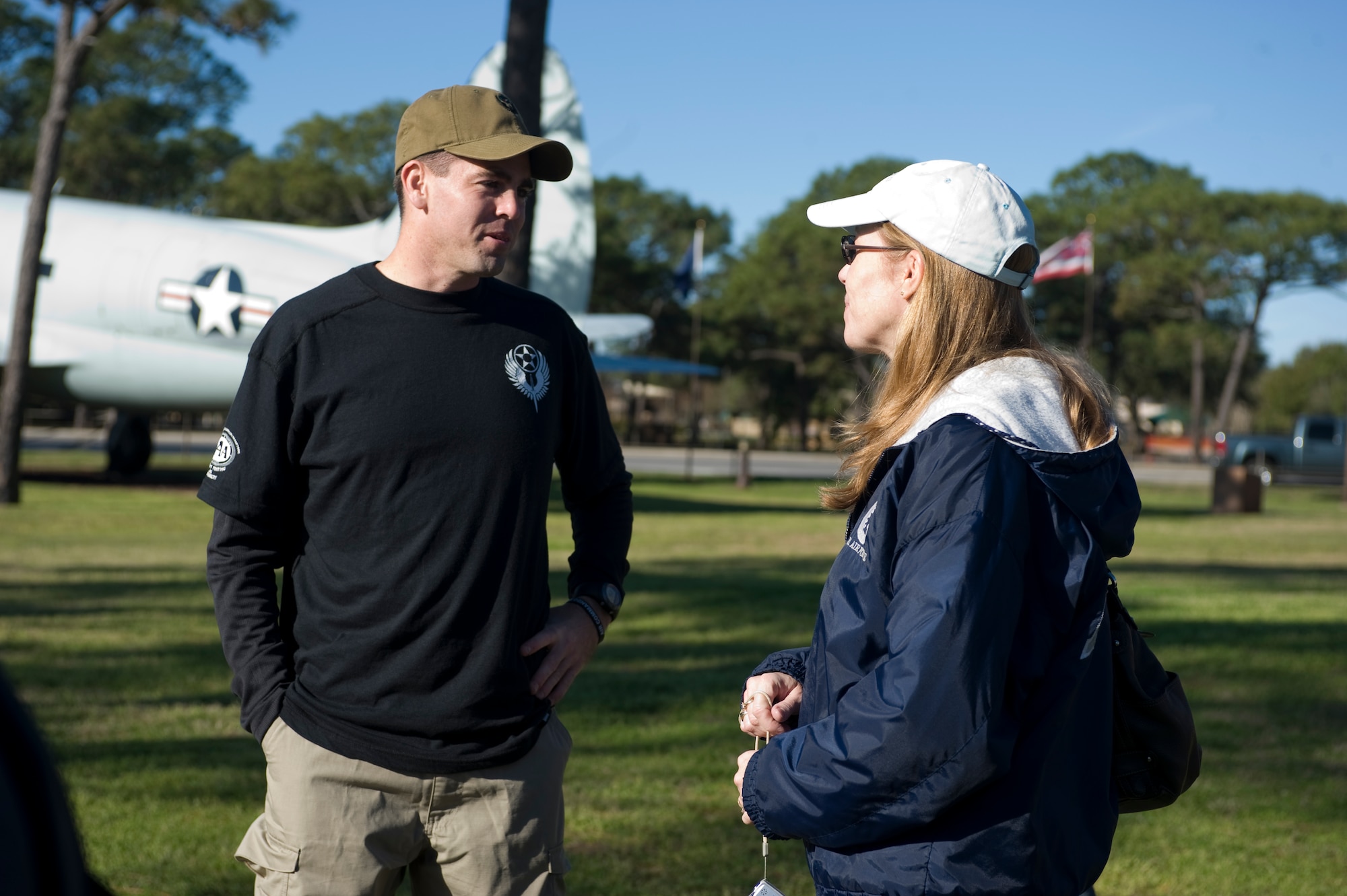 Maj.  Tom Leyden, chief of scheduling of the 34 Special Operations Squadron, left, speaks with Holly Loftis, widow of Lt. Col. John Loftis, before the kickoff of the 2nd Annual Air Commando Ruck and Climb at the Air Park at Hurlburt Field, Fla., Feb. 3, 2013. Lt. Col. Loftis was killed in Kabul, Afghanistan, Feb. 25, 2012. (U.S. Air Force Photo/Airman 1st Class Hayden K. Hyatt)