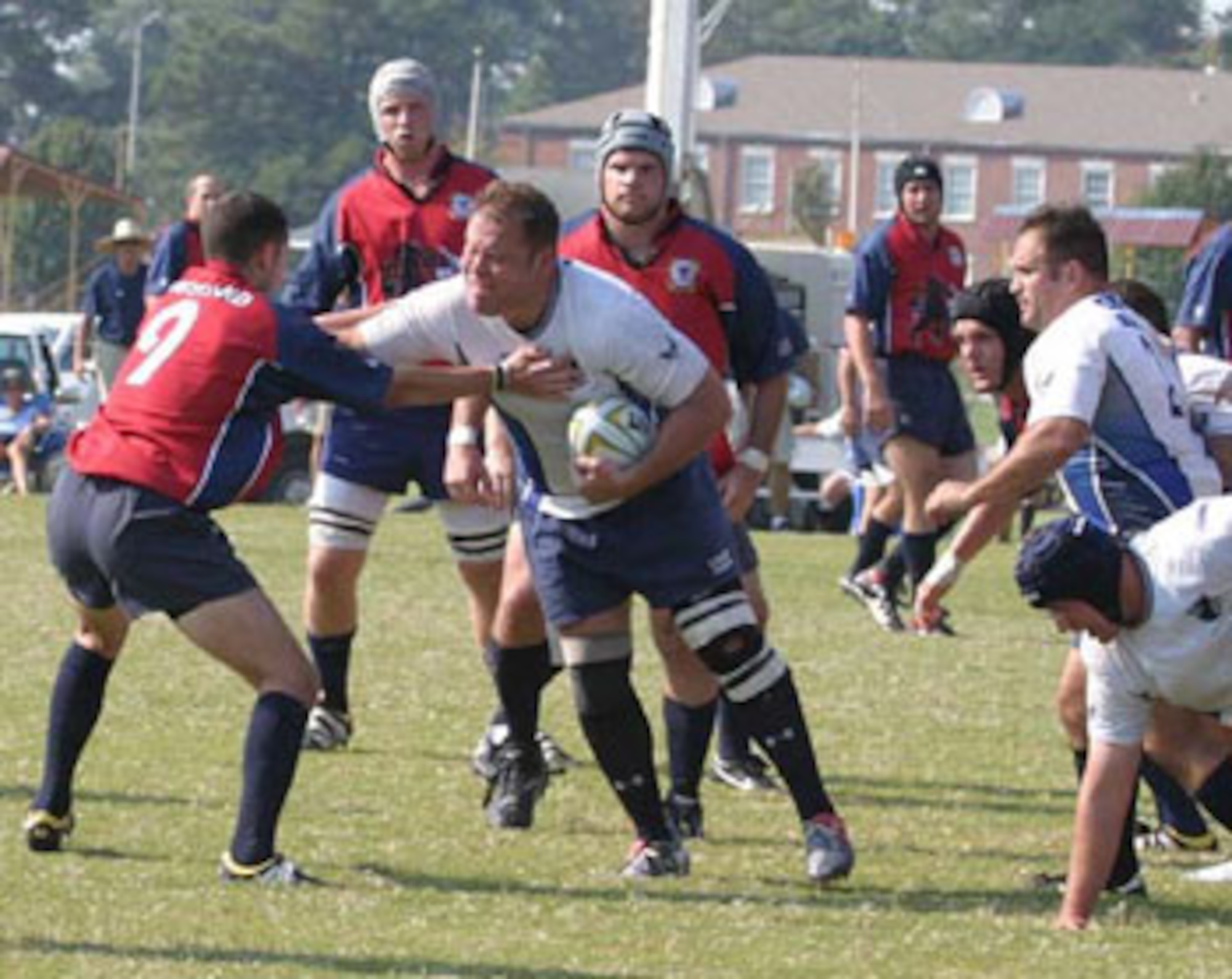 Senior Master Sgt. Jeremy Allen, shown here playing rugby, is the Tinker AFB “Athlete of the Year” for 2012. The sergeant, who serves in the 513th Aircraft Maintenance Squadron, participates in Armed Forces Rugby, base flag football and Tinker bowling, and mentors members of the 513 AMXS and his deployed unit, the 380th Expeditionary Aircraft Maintenance Squadron, in matters of wellness and physical fitness. (Courtesy photo)