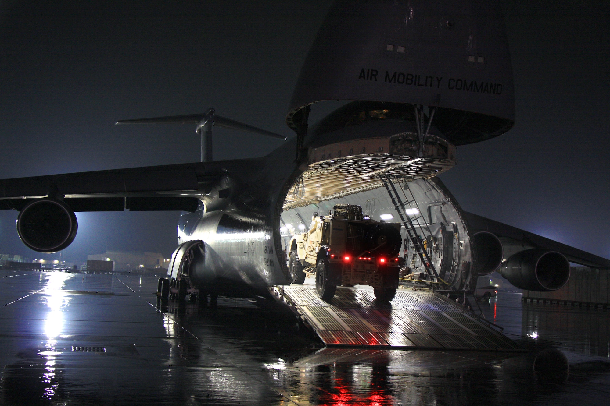 An Oshkosh M-ATV Mine Resistant, Ambush Protected vehicle, or MRAP, drives onto a C-5M Super Galaxy to be chained down and flown out. The C-5M Super Galaxy has served the U.S. Air Force since 1969, and continues to provide vital heavy air lift to troops worldwide. (U.S. Army photo/1st Lt. Henry Chan, 18th Combat Sustainment Support Battalion Public Affairs)