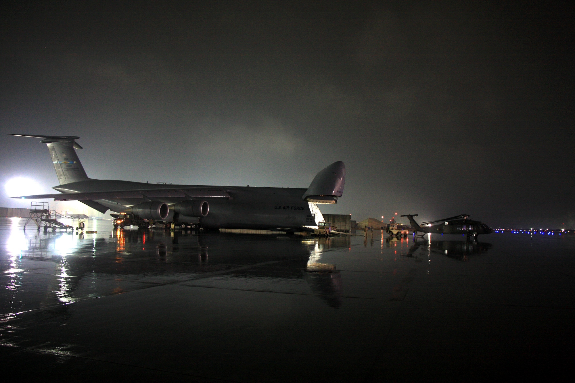 Soldiers and Airmen offload a UH-64 Black Hawk helicopter from a C-5M Super Galaxy at Bagram Air Field. The C-5M Super Galaxy has served the U.S. Air Force since 1969, and continues to provide vital heavy air lift to troops worldwide. (U.S. Army photo/1st Lt. Henry Chan, 18th Combat Sustainment Support Battalion Public Affairs)