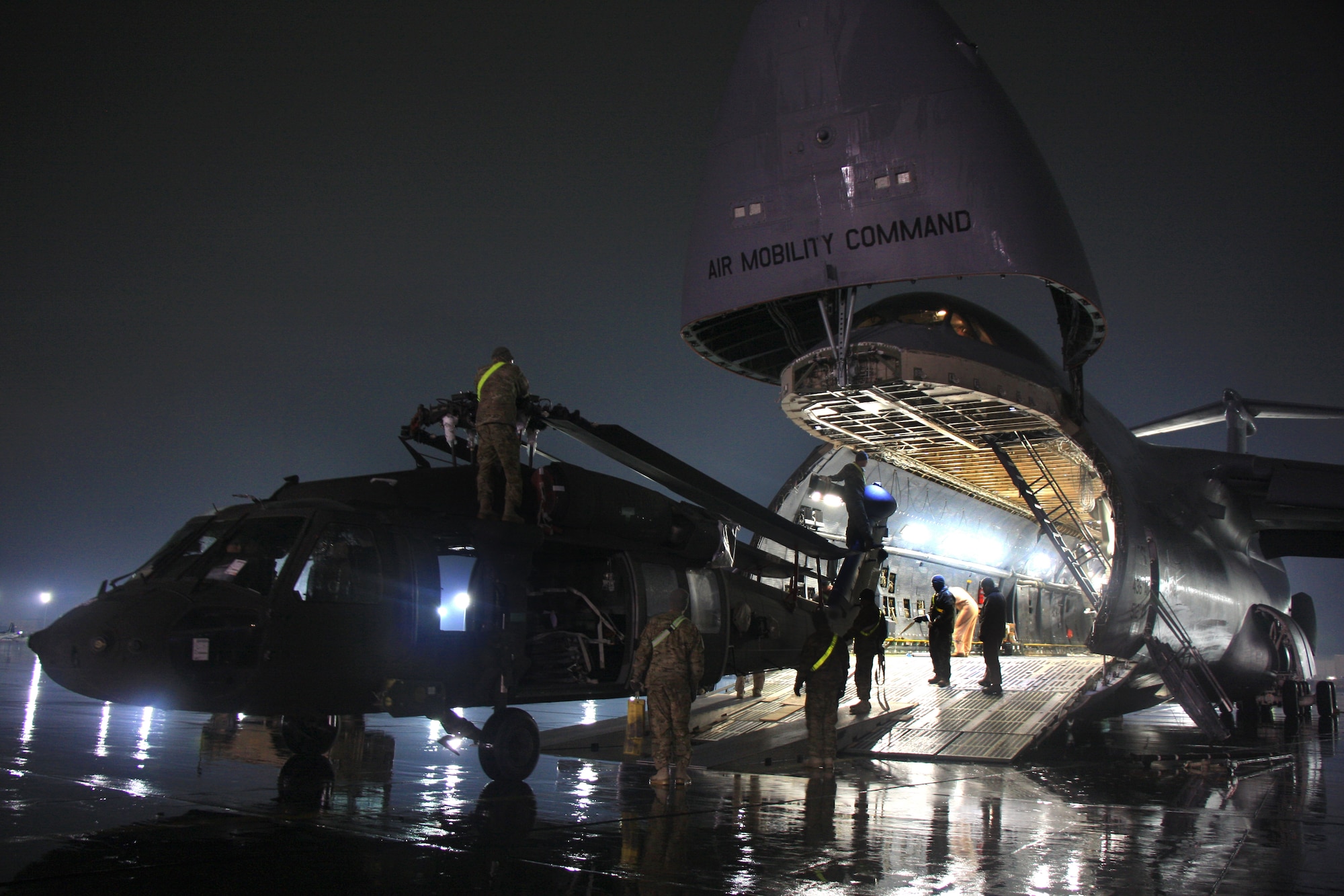 Soldiers and Airmen offload a UH-64 Black Hawk helicopter from a C-5M Super Galaxy at Bagram Air Field. The C-5M Super Galaxy has served the U.S. Air Force since 1969, and continues to provide vital heavy air lift to troops worldwide. (U.S. Army photo/1st Lt. Henry Chan, 18th Combat Sustainment Support Battalion Public Affairs)