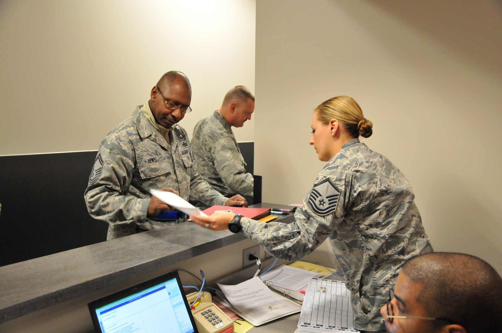 Master Sgt. Elena Lund, 94th Airlift Wing law office superintendent, briefs members of the 94th AW during phase one of preparation for an upcoming operational readiness exercise on Jan. 6 here. This phase, the first of three, required participating Airmen to inventory and prepare equipment for shipment for a mock deployment and go through a deployment line in building 819 – recently renovated to accommodate an increased operational tempo. (U.S. Air Force photo/Senior Airman Elizabeth Van Patten)