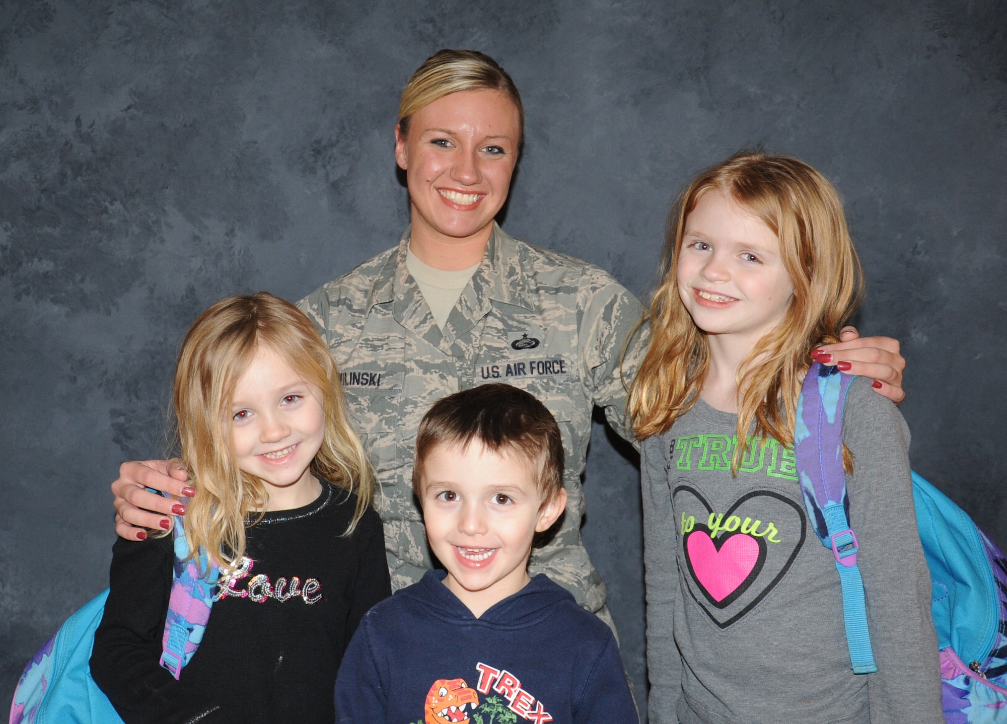 Tech. Sgt. Jeanette Wilinski, Air Force Reserve Command Readiness Management Group manning control and special operations assistant NCOIC, is the mother of Elizabeth, Logan and Alexis.  As a single mom, she has to find a balance between taking care of the Air Force mission and taking care of her children.  (U.S. Air Force photo/Staff Sgt. Maria Bowman)