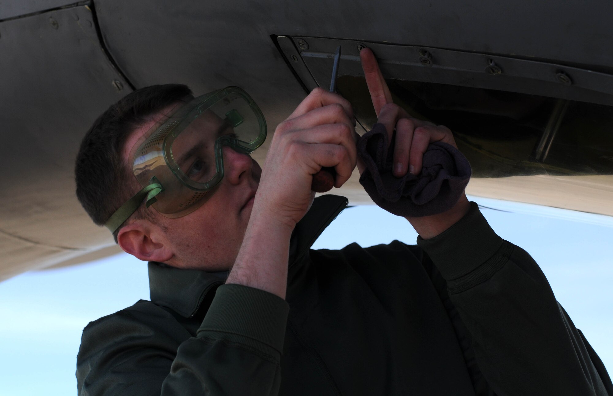 Airman 1st Class Christopher Kelley, a KC-135 crew chief from the 100th Aircraft Maintenance Squadron, RAF Mildenhall, England, complete post-flight recovery procedures on a jet after a mission over Africa Feb. 3, 2013. Airmen from RAF Mildenhall deployed to southwest Europe in January to support French operations in Mali. (U.S. Air Force photo by Staff Sgt. Austin M. May)