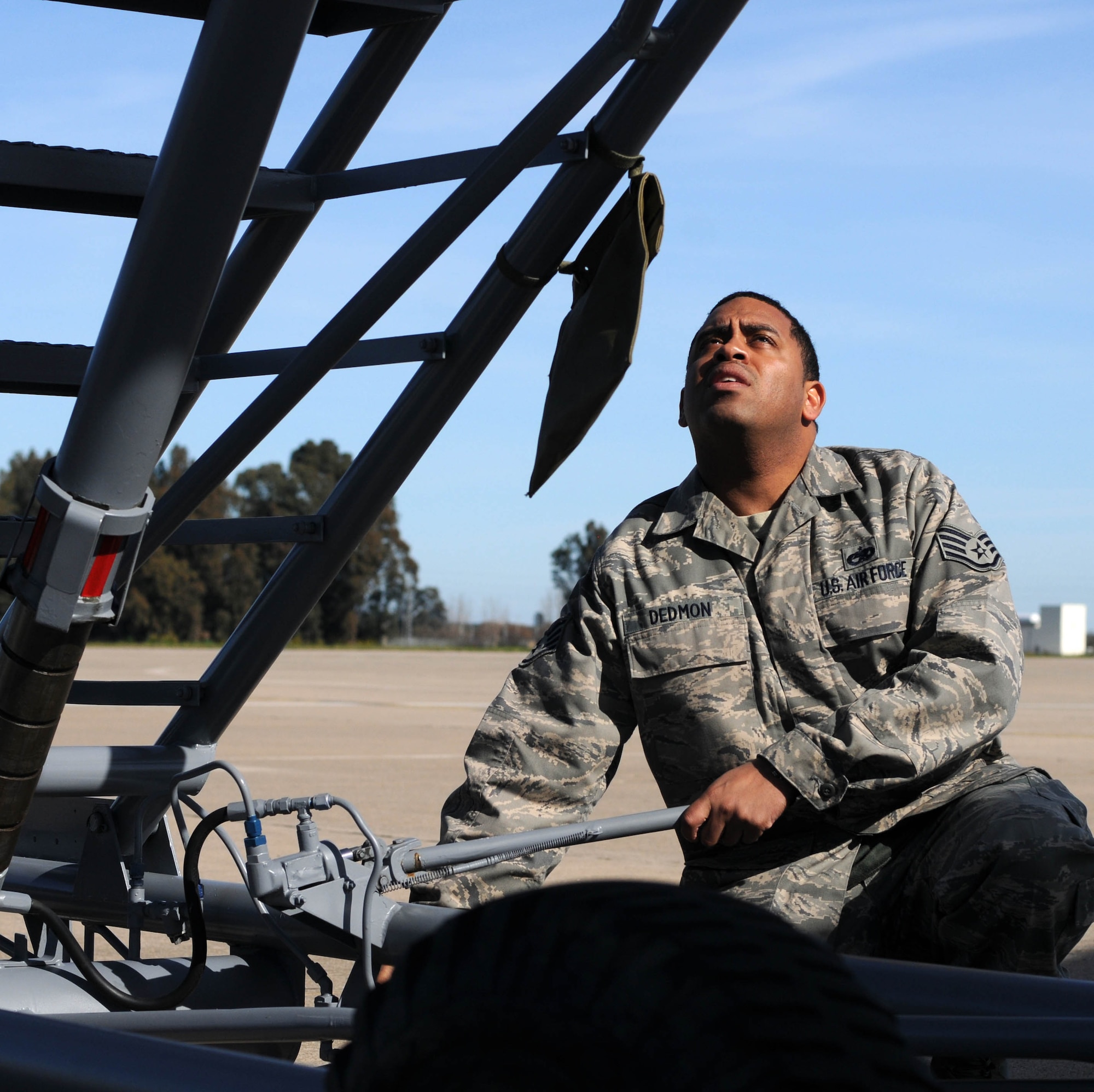 Staff Sgt. Michael Dedmon, a KC-135 crew chief from the 100th Aircraft Maintenance Squadron, RAF Mildenhall, England, completes post-flight recovery procedures on a jet after a mission over Africa Feb. 3, 2013. Airmen from RAF Mildenhall deployed to southwest Europe in January to support French operations in Mali. (U.S. Air Force photo by Staff Sgt. Austin M. May)