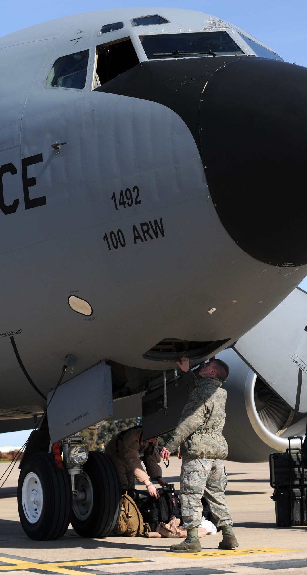 Senior Airman Kyle Nickels, a KC-135 crew chief from the 100th Aircraft Maintenance Squadron, RAF Mildenhall, England, inspects a jet after a mission over Africa Feb. 3, 2013. Airmen from RAF Mildenhall deployed to southwest Europe in January to support French operations in Mali. (U.S. Air Force photo by Staff Sgt. Austin M. May)