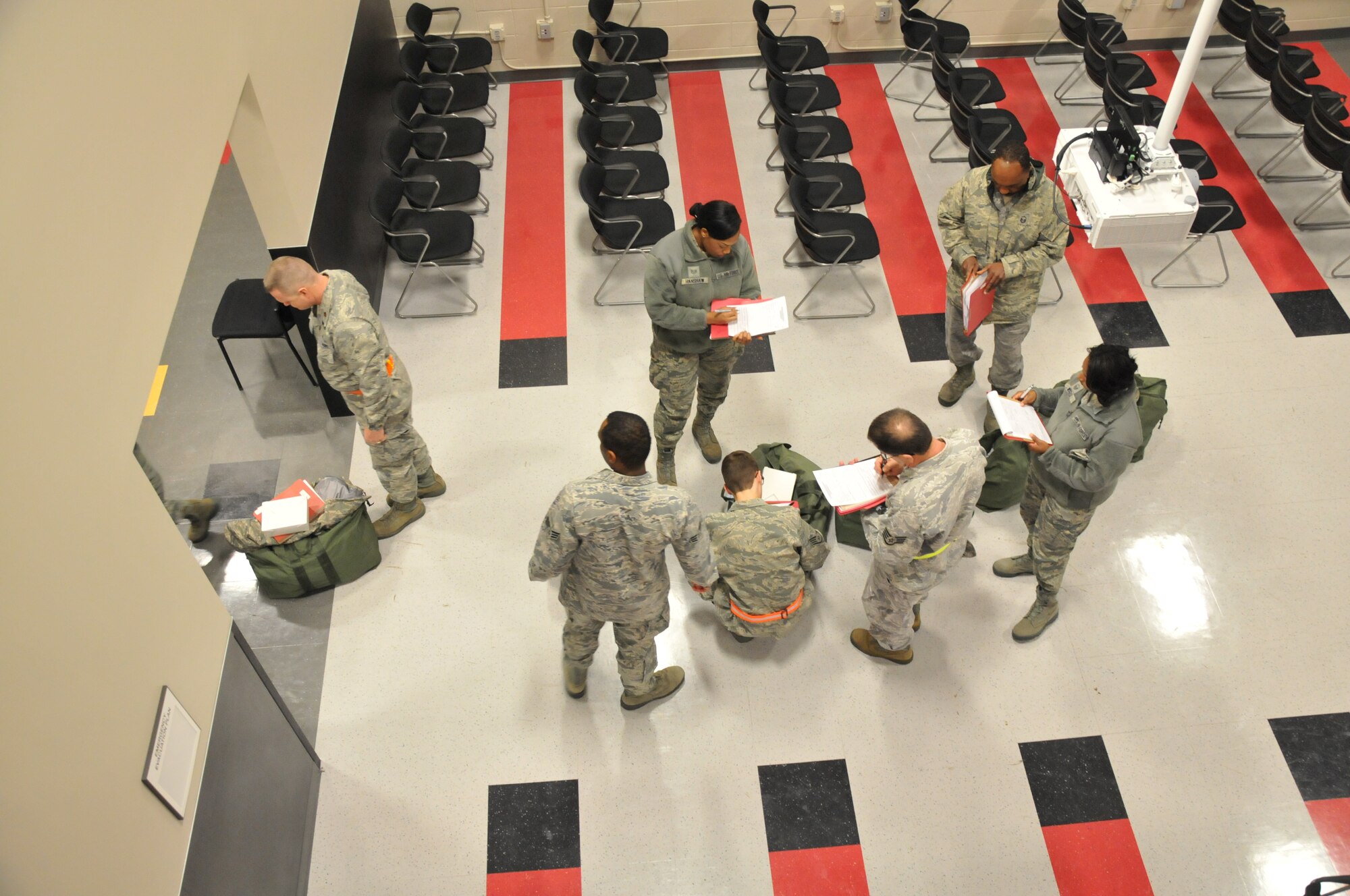 Selected members of the 94th Airlift Wing completed phase one of preparation for an upcoming operational readiness exercise on Jan. 6 here. This phase, the first of three, required participating Airmen to inventory and prepare equipment for shipment for a mock deployment and go through a deployment line in building 819 – recently renovated to accommodate an increased operational tempo. (U.S. Air Force photo/Senior Airman Elizabeth Van Patten)
