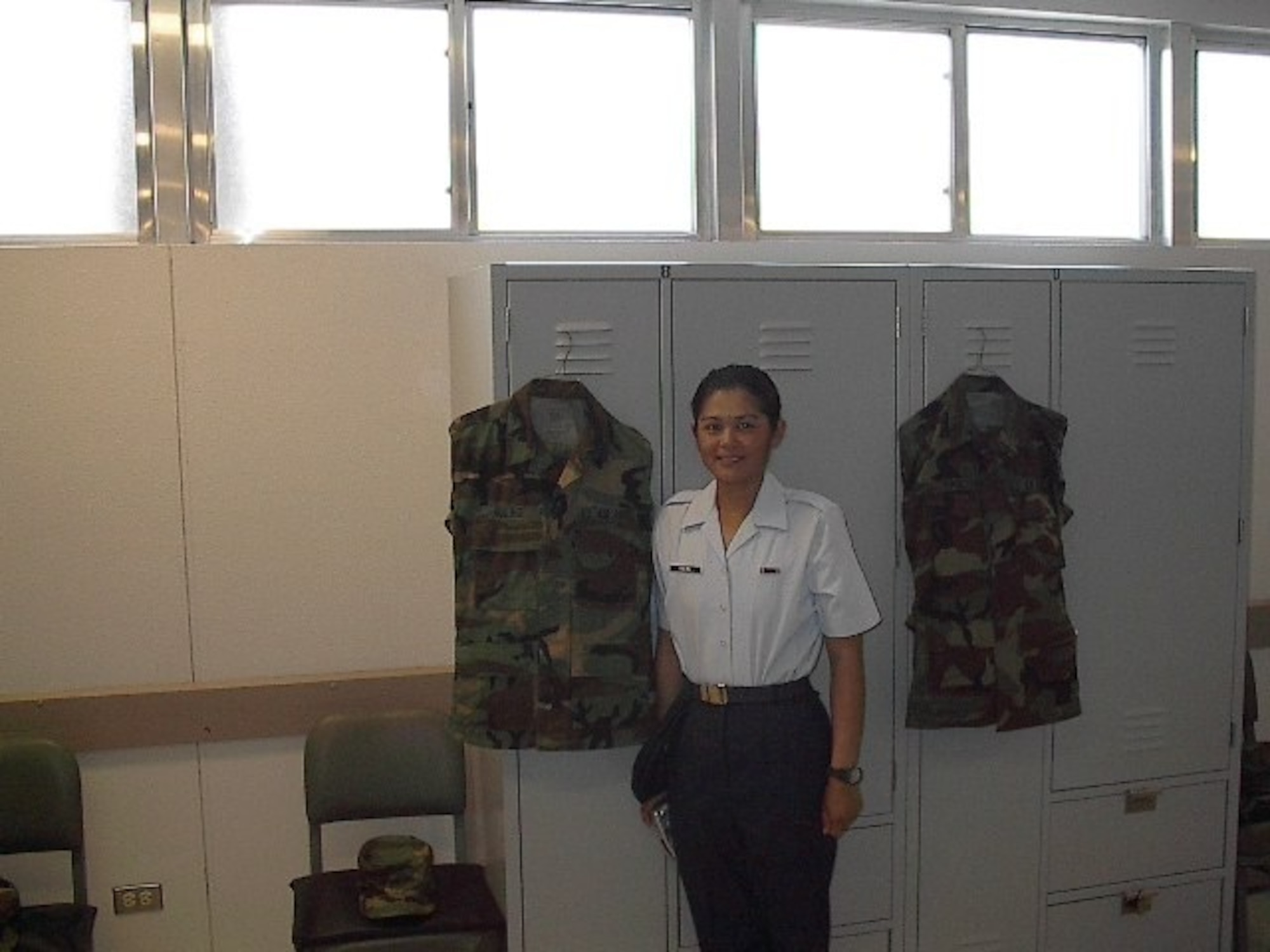 Master Sgt. Kanya Briner poses in front of her wall locker after graduating from Basic Military Training in 2001.  Briner decided to join the Air Force Reserve after her husband was killed in a landslide in 1999. (Courtesy Photo)