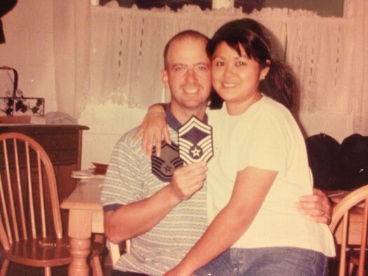 Master Sgt. Scott Huling and his wife Kanya pose for a picture after finding out Huling had been selected for Senior Master Sgt. Huling would be killed in a landslide while protecting his son from falling debris on Mother’s Day 1999. Kanya would go on to join the Air Force Reserve. (Courtesy Photo) 