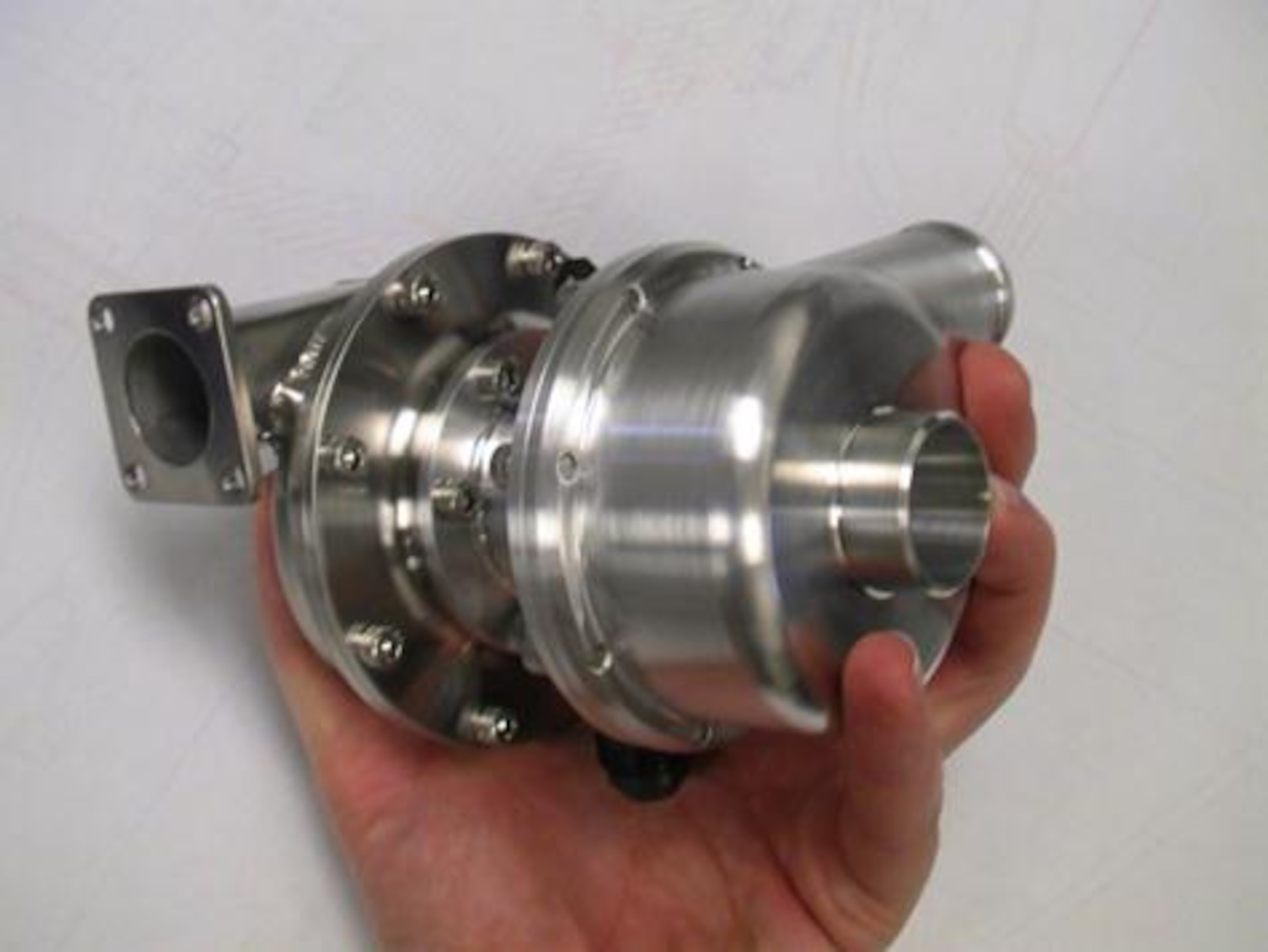 Lightweight turbocharger, intended for use on 30-50 horsepower class engines, has potential application to a wide variety of vehicles, such as unmanned air vehicles, airborne auxiliary power units, and private aircraft.  (AFRL Image)