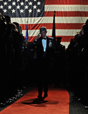Retired Gen. Norton Schwartz, the 19th chief of staff of the Air Force, pays his last respects to the enlisted members in attendance during an Air Force Special Operations Command Order of the Sword ceremony at the Emerald Coast Convention Center on Okaloosa Island, Fla., Feb. 1, 2013. The ceremonial presentation was adopted from the Royal Order of the Sword and passed to the United States during the Revolutionary War. (U.S. Air Force photo/Senior Airman Desiree Whitney Moyé) 