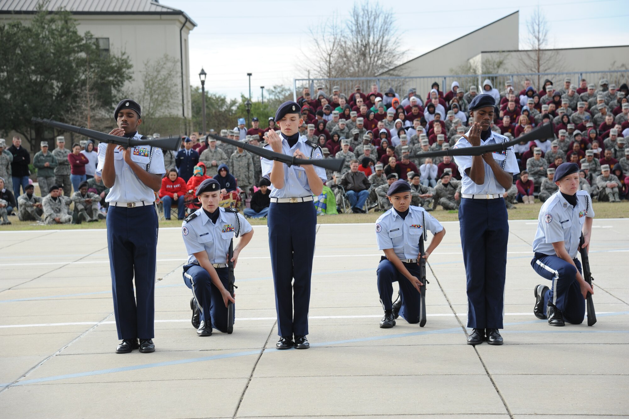 Biloxi High School Junior ROTC students perform two drill demonstrations during the 81st Training Group’s first drill down competition of the season Feb. 1, 2013, at the Levitow Training Support Facility, Keesler Ai r Force Base, Miss.  The event allowed both the Junior ROTC students and Keesler’s technical training students to showcase their talents and discipline outside the classroom.  (U.S. Air Force photo by Kemberly Groue)