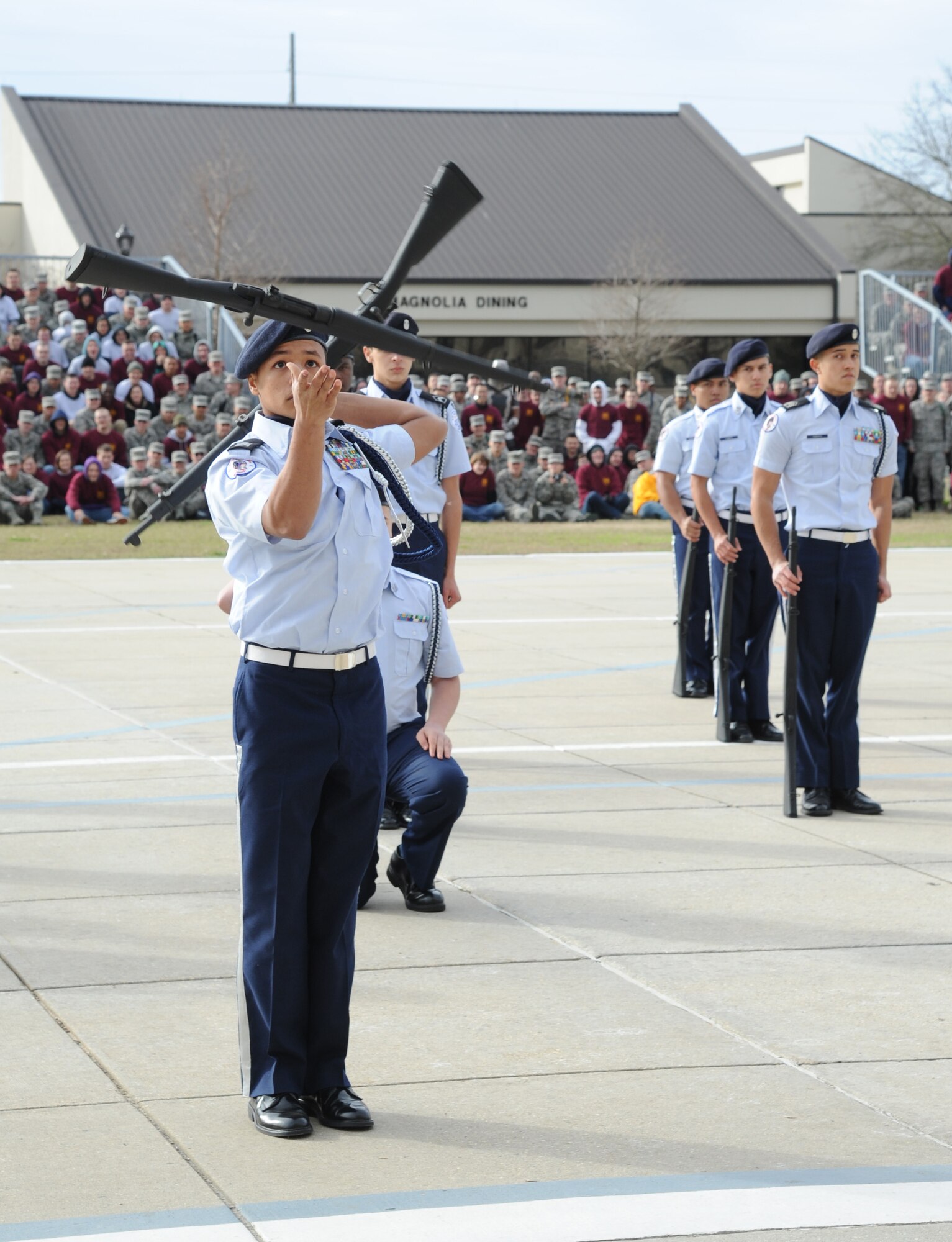 Biloxi High School Junior ROTC students perform two drill demonstrations during the 81st Training Group’s first drill down competition of the season Feb. 1, 2013, at the Levitow Training Support Facility, Keesler Ai r Force Base, Miss.  The event allowed both the Junior ROTC students and Keesler’s technical training students to showcase their talents and discipline outside the classroom.  (U.S. Air Force photo by Kemberly Groue)