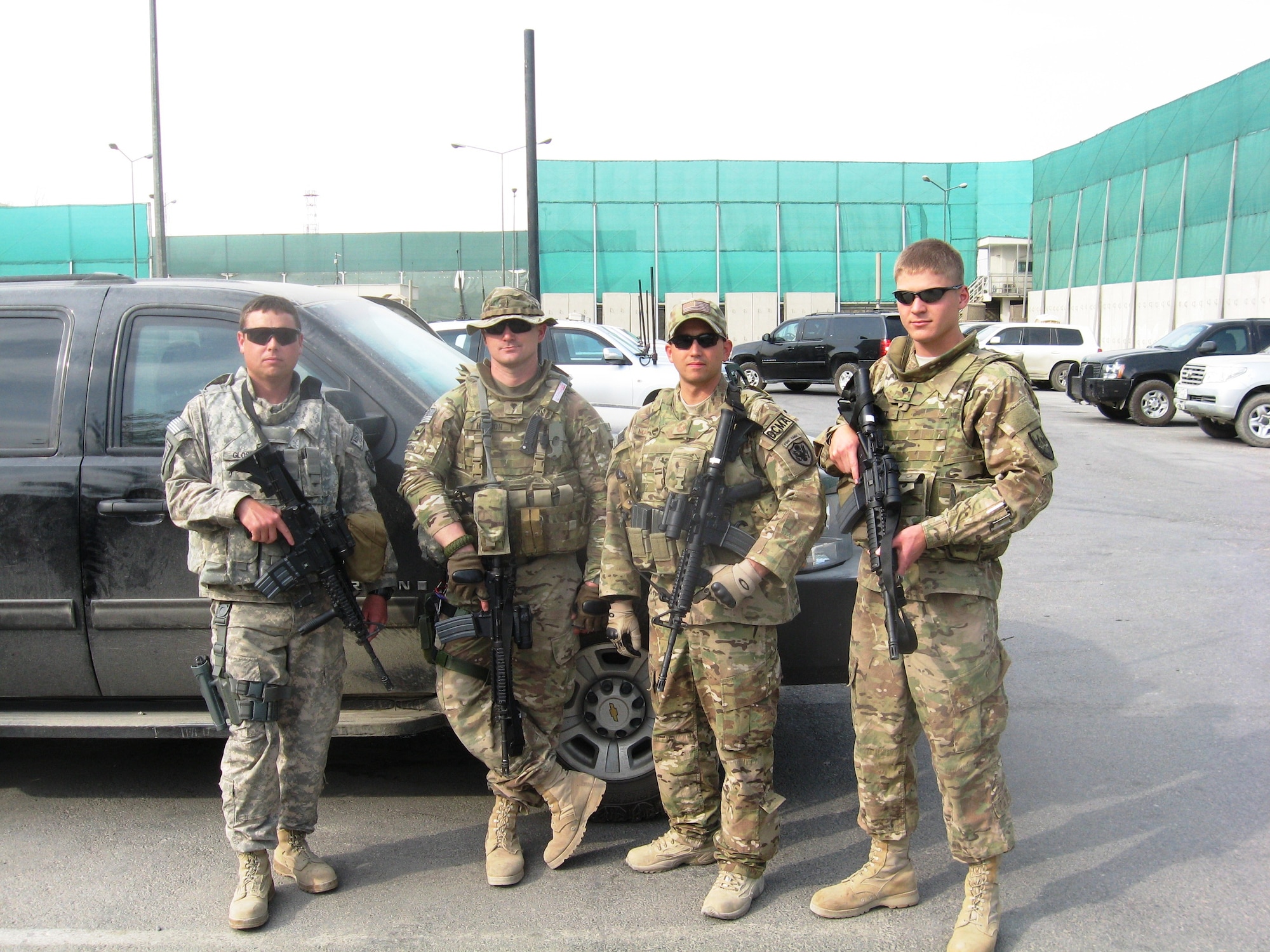 Master Sgt. Ryan Glosson, 366th Security Forces Squadron first sergeant (left), poses with a team before an outside-the-wire mission in Afghanistan, to perform a fire inspection at a forward operating base. Glosson and fellow firefighter Tech. Sgt. John Knight were involved in a rockets attack May 6, 2012, where Glosson was thrown to the floor and knocked unconscious, and Knight with wounded by shrapnel. (Courtesy photo)