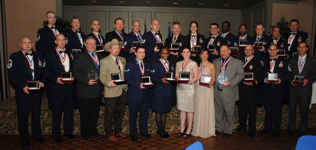 The 82nd Training Wing's 2012 Annual Award winners display their plaques Feb. 2. The winners were announced during a banquet at the Wichita Falls Country Club with guest speaker, Chief Master Sgt. of the Air Force #11 David Campanale. (U.S. Air Force photo/A1C Jelani Gibson)
