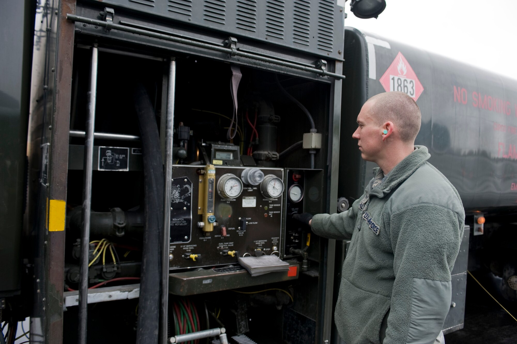 Senior Airman Christopher Walt, 376th Expeditionary Logistics Readiness Squadron petroleum, oils and lubricants journeyman, fuels a KC-135 Stratotanker Feb. 4, 2013, at Transit Center at Manas, Kyrgyzstan. Walt is deployed from Altus Air Force Base, Okla., and is a native of Brandon, Miss. (U.S. Air Force photo/Staff Sgt. Stephanie Rubi)