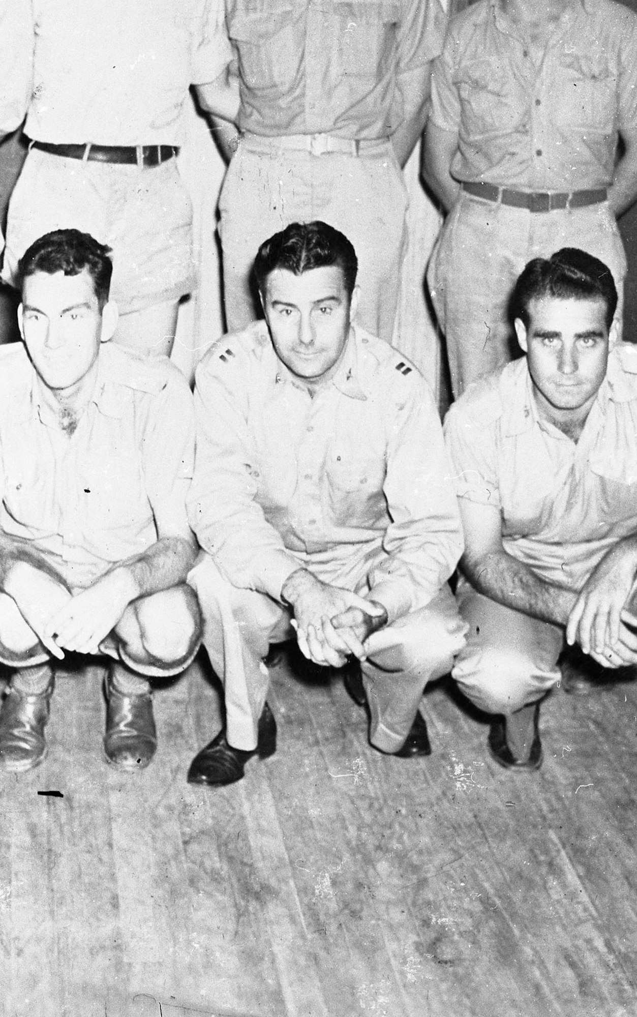 Capt. Frank P. Bostrom (center), the officer in charge of the three B-17s on the Royce special mission, piloted one of the 12 B-17s that arrived over Hawaii several months earlier on a flight from the United States just in time for the Japanese attack. With no ammunition on board his B-17, Capt. Bostrom could do little more than try to escape, so he played tag around Oahu with Japanese fighters before he was finally able to land safely on a golf course. (U.S. Air Force photo)