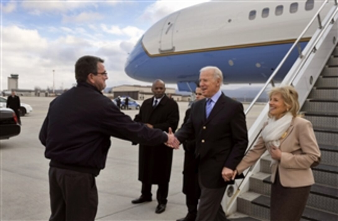 Deputy Secretary of Defense Ashton B. Carter greets Vice President Joe Biden and Second Lady Jill Biden as they arrive in Ramstein, Germany, on Feb. 3, 2013.  Carter and the Bidens will visit wounded warriors recovering at Landstuhl Regional Medical Center to thank them for their service.  Both Carter and Biden attended the 49th Munich Security Conference in Munich the previous day.  The conference is an annual meeting of heads of state, foreign affairs leaders and defense policy leaders from around the world.  Germany is the second stop of Carter’s six-day trip to meet with officials in France, Germany and Jordan
