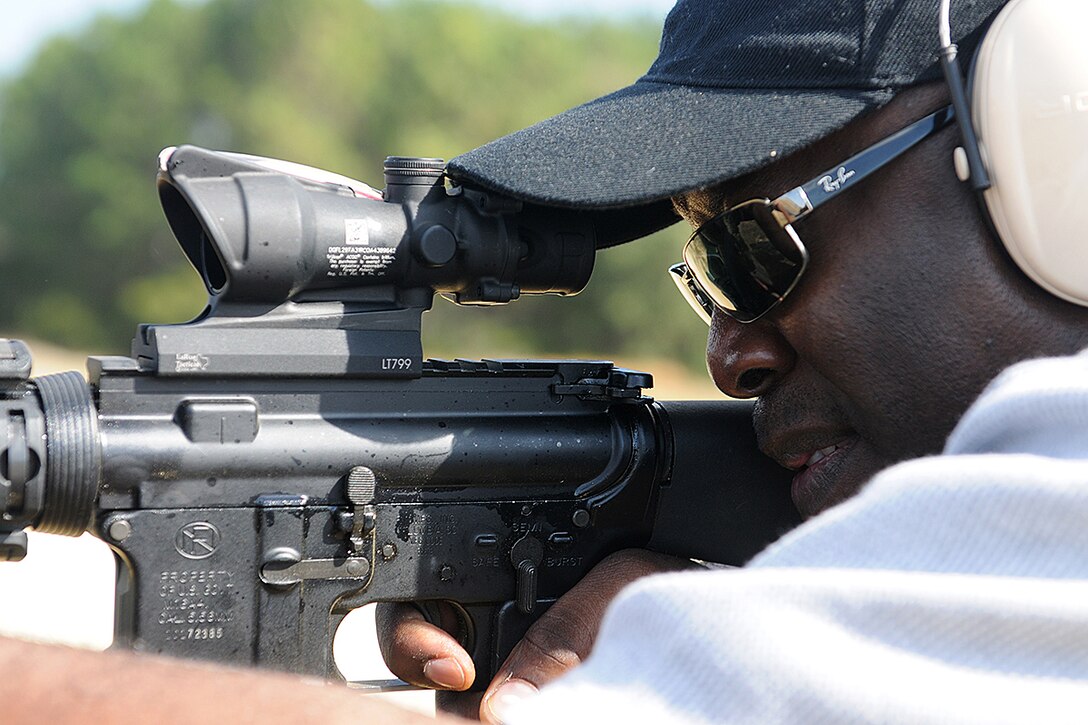 An educator from the Orlando and Fort Lauderdale area aims down range getting ready to fire during the Educator's Workshop aboard Parris Island, S.C., Jan. 30, 2013. Educators from the surrounding areas visit Parris Island every once and a while to get a three day boot camp so that they are able to help students that want to join the Marine Corps. (U.S. Marine Corps photo by Pfc. John-Paul Imbody)