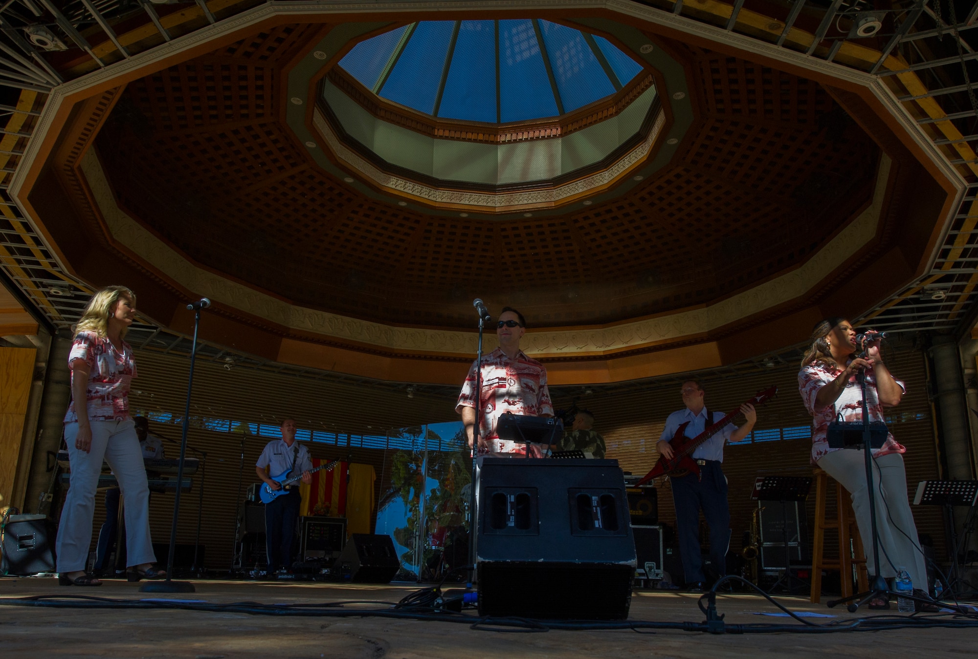 (From left) Master Sgt. Lara Murdzia, Senior Airman Devin Rivas-Martin, and Tech. Sgt. Tamiko Boone, vocalists from the Pacific Air Forces Band of the Pacific’s “Hana Hou” ensemble from Joint Base Pearl Harbor-Hickam, Hawaii, perform Feb. 3 on the bandstand at Kapiolani Park in Honolulu, Hawaii, during the Vietnamese New Year celebration. Known in Vietnamese by its shortened name, “T?t Nguyên Ðán,” the celebration marks the first day of the lunar new year and serves as an opportunity for Vietnamese-Americans to worship ancestors, be with family, and forget the troubles of the past year while hoping for a better new year. (U.S. Air Force photo by Staff Sgt. Nathan Allen)