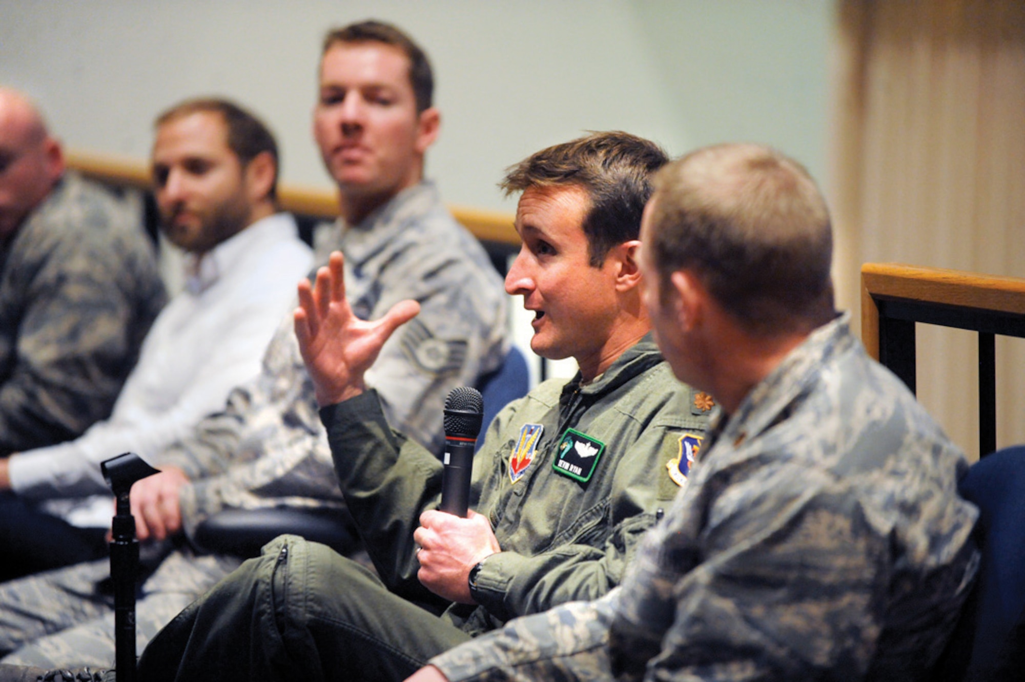 Maj. Devin Ryan discusses his role in combat rescue operations as shown in the National Geographic Channel documentary "Inside Combat Rescue" at the Air Force Academy Feb. 1, 2013. Ryan is a 2001 Academy graduate and an HH-60 Pave Hawk pilot with the 66th Rescue Squadron at Nellis Air Force Base, Nev. The six-part TV series premieres Feb. 18. (U.S. Air Force photo/Carol Lawrence)