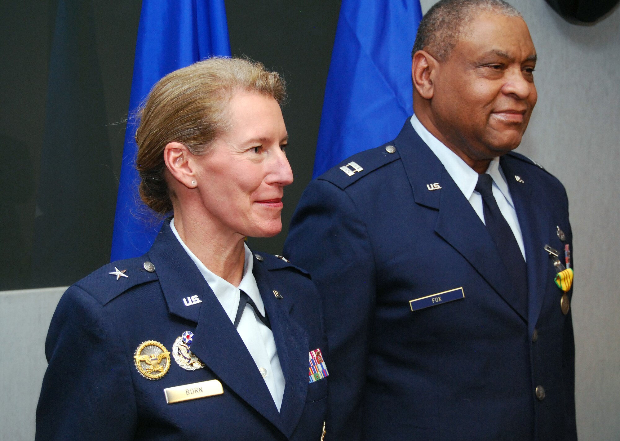 Retired Capt. Jimmie Fox, right, stands next to Brig. Gen. Dana Born at the conclusion of a ceremony Feb. 4, 2013, at the Air Force Academy Visitor Center wherein he received a Vietnam Service Medal. Fox supported the U.S. evacuation of Saigon, South Vietnam, April 29-30, 1975. Airmen who served in that operation became eligible for the medal in 2003. Born is the Academy's dean of the faculty. (U.S. Air Force photo/Don Branum)