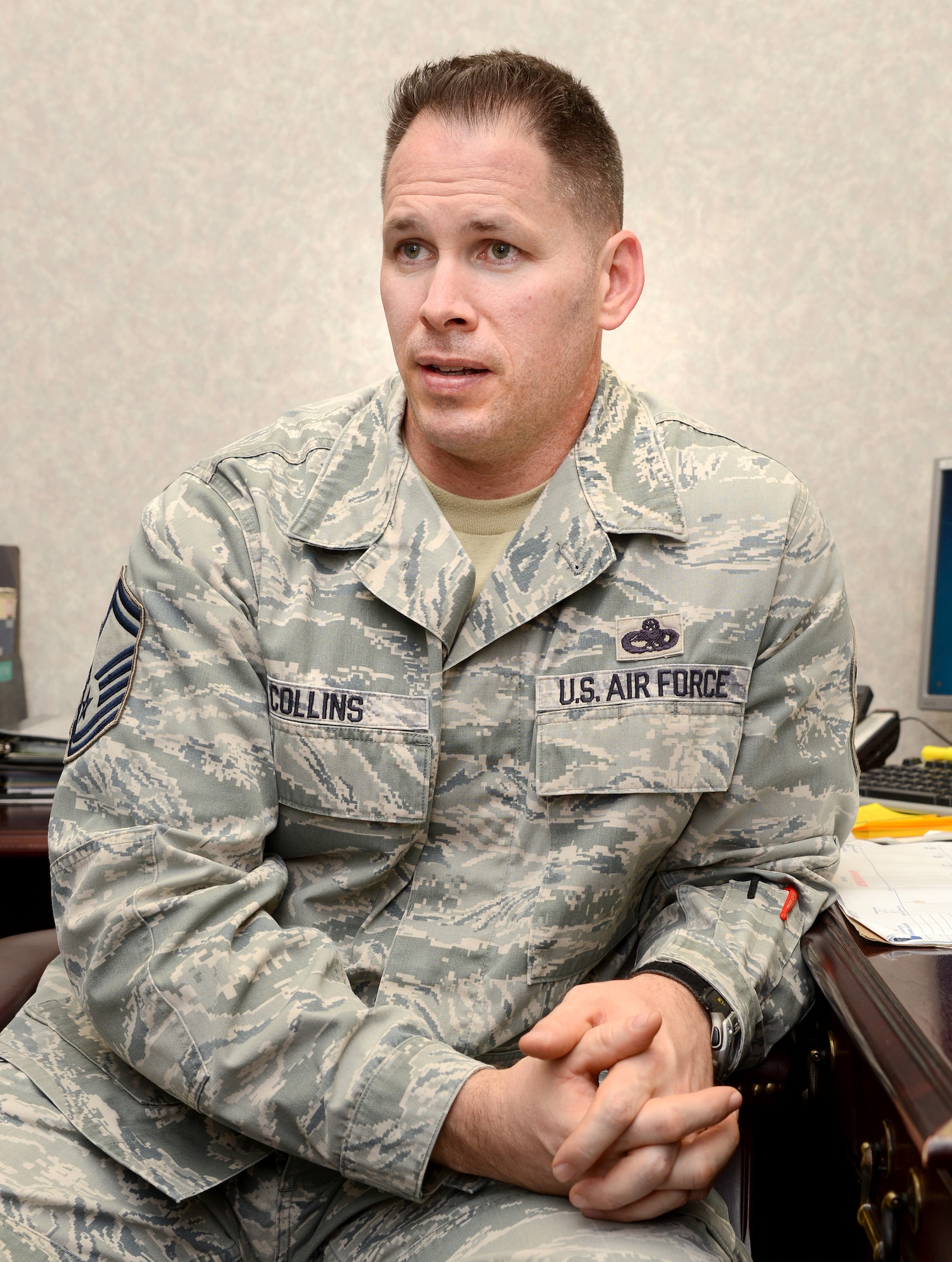 Senior Master Sergeant Jesse A. Collins III, White Aircraft Maintenance Unit superintendent in the 552nd Aircraft Maintenance Squadron, talks about being awarded the Bronze Star for meritorious achievement while deployed in Iraq from June 2010 to June 2011. He said that one of his greatest challenges while deployed was “juggling meeting the needs of the Air Force, whose mission does not stop,” and managing life issues with other Airmen. (Air Force photo by Kelly White)