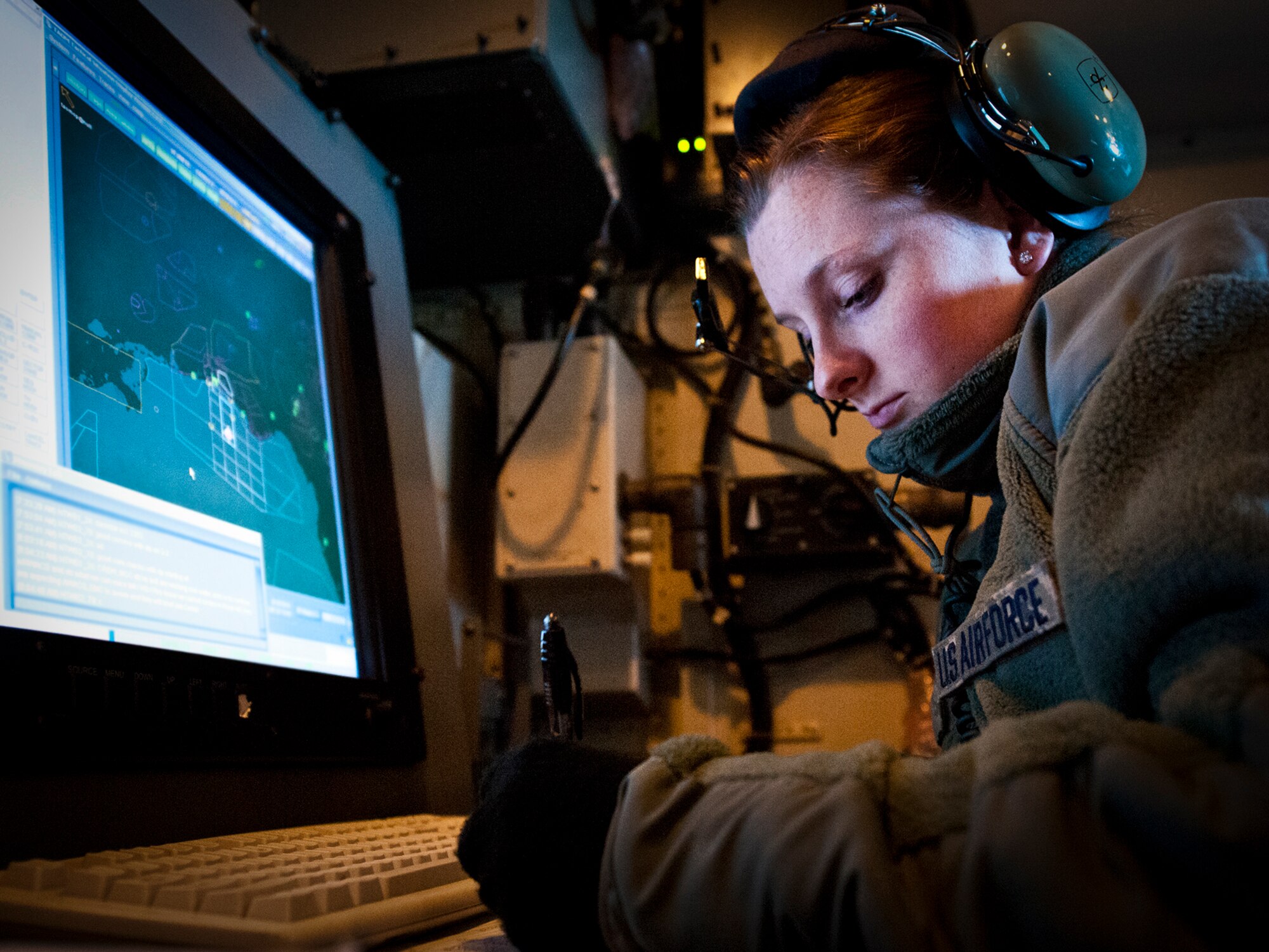 Airman 1st Class Kendel Coen, a surveillance technician with the 728th Air Control Squadron, takes notes in front of her scope prior to the squadron’s final mission Jan. 31 at Eglin Air Force Base, Fla.  The 62-year-old squadron, an air command and control unit, will be deactivated in May.  Their final mission was to control 33rd Fighter Wing F-35s for a tactical intercept mission.  (U.S. Air Force photo/Samuel King Jr.)