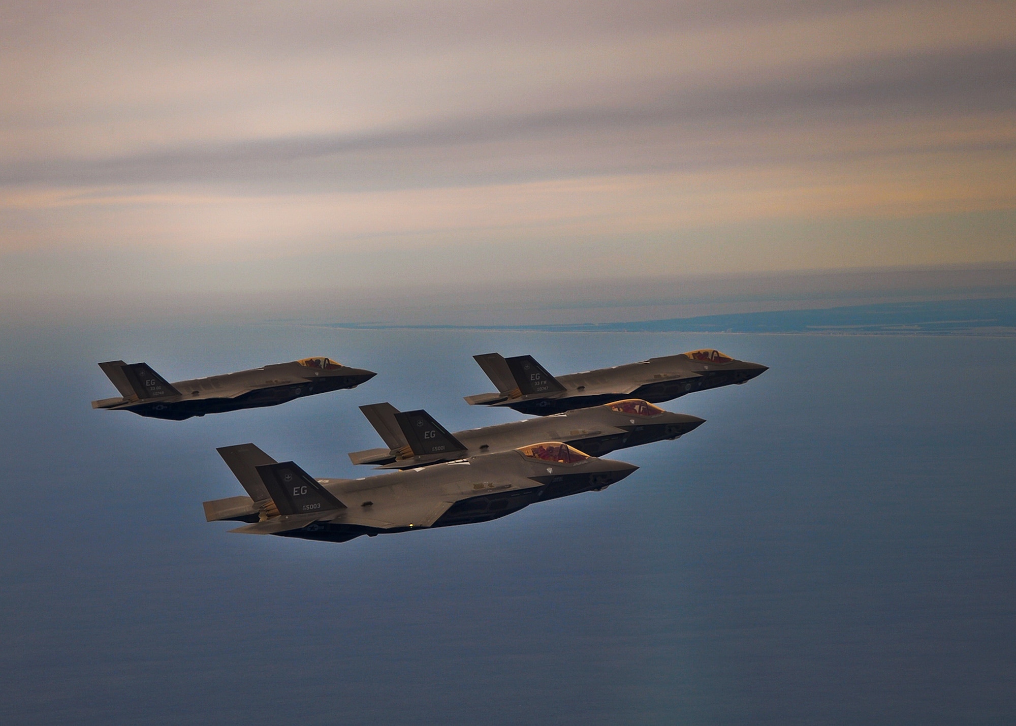A four-ship of F-35A Lightning IIs returns to Eglin Air Force Base, Fla., after a sortie Feb. 1.  Pilots with the 33rd Fighter Wing began flying the formation for the first time here last week.  (U.S. Air Force photo/Capt. Edward Schmitt)
