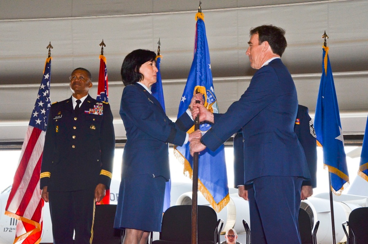 During a Change of Command Ceremony held on February 2, 2013, Col Jonathan T. Wall is shown accepting the 172d AW unit flag from Maj Gen Catherine Lutz, Commander, Mississippi Air National Guard. 