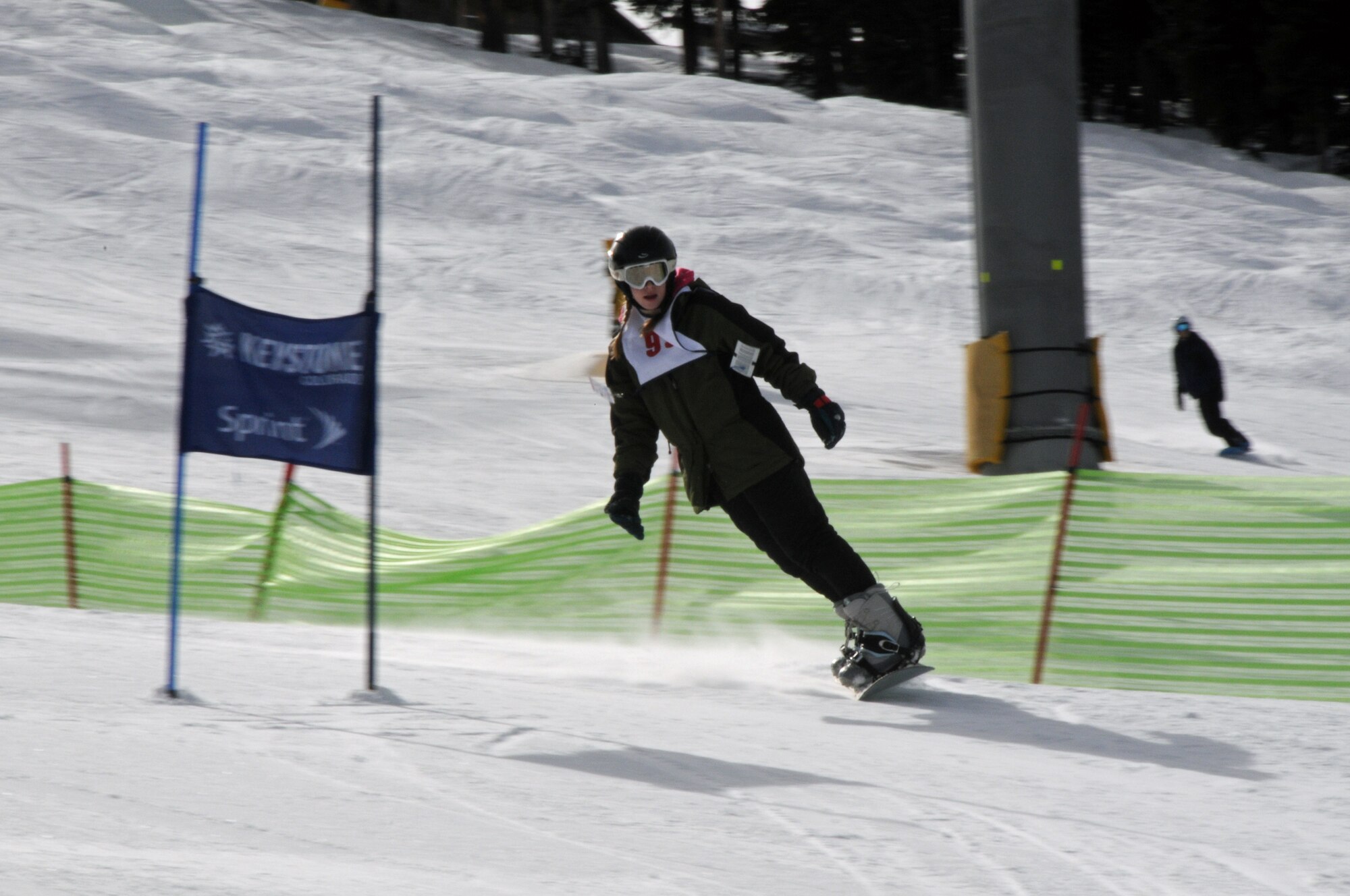 KEYSTONE, Colo. -- Tayler Baize competes in the snowboarding race Jan. 26 at SnoFest. Baize placed second in her category with a time of 35.45 seconds. SnoFest is an annual military ski weekend held at Keystone Resort. (Photo courtesy/Herb Wetzel)
