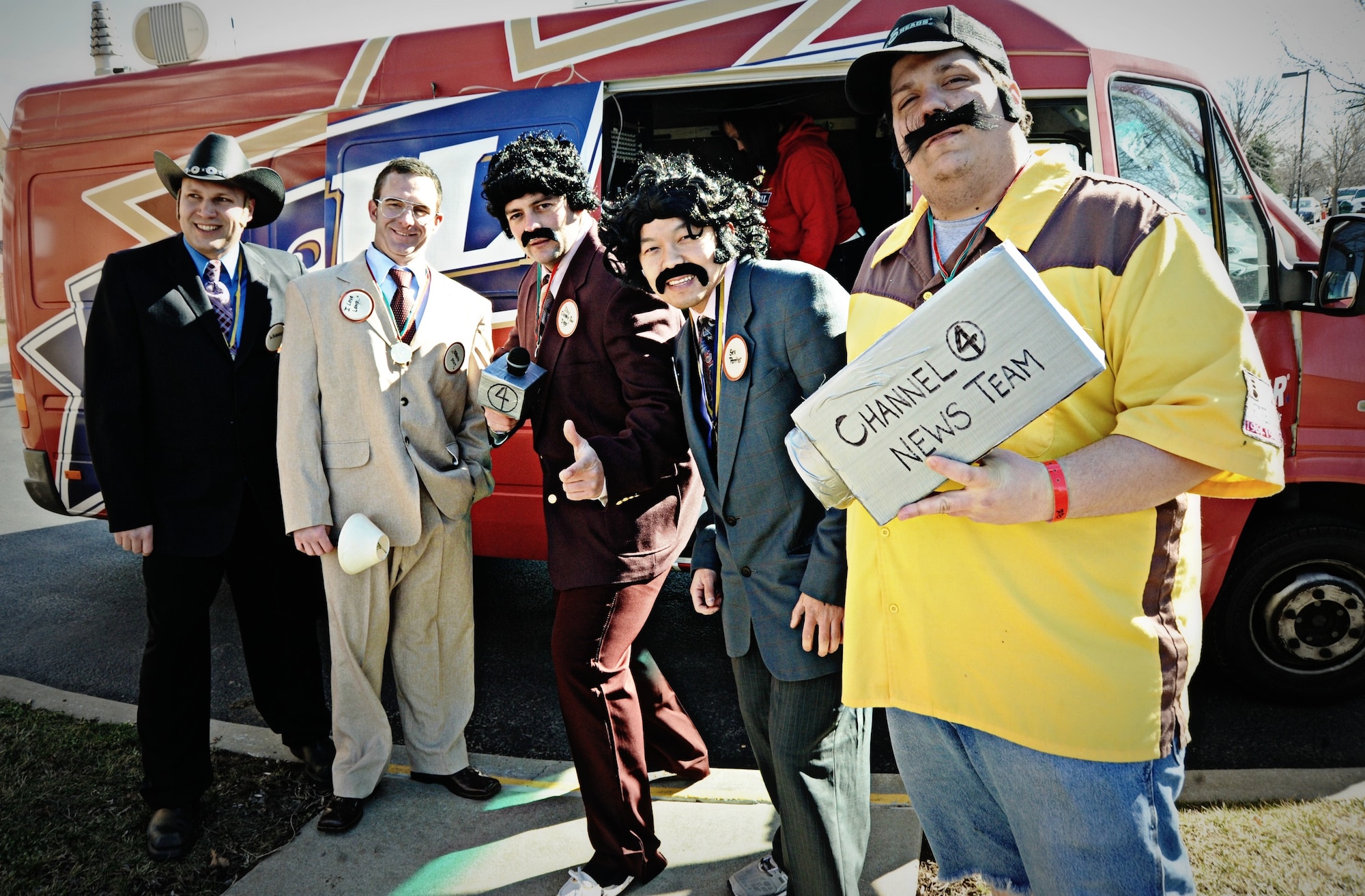 The team dressed up as characters from the movie, “Anchorman,” and dedicated their Polar Plunge to Alicia Norton, the sister of team captain Staff Sgt. Richard Norton who could not attend due to a family emergency. (U.S. Air Force photo/Karen Petitt)