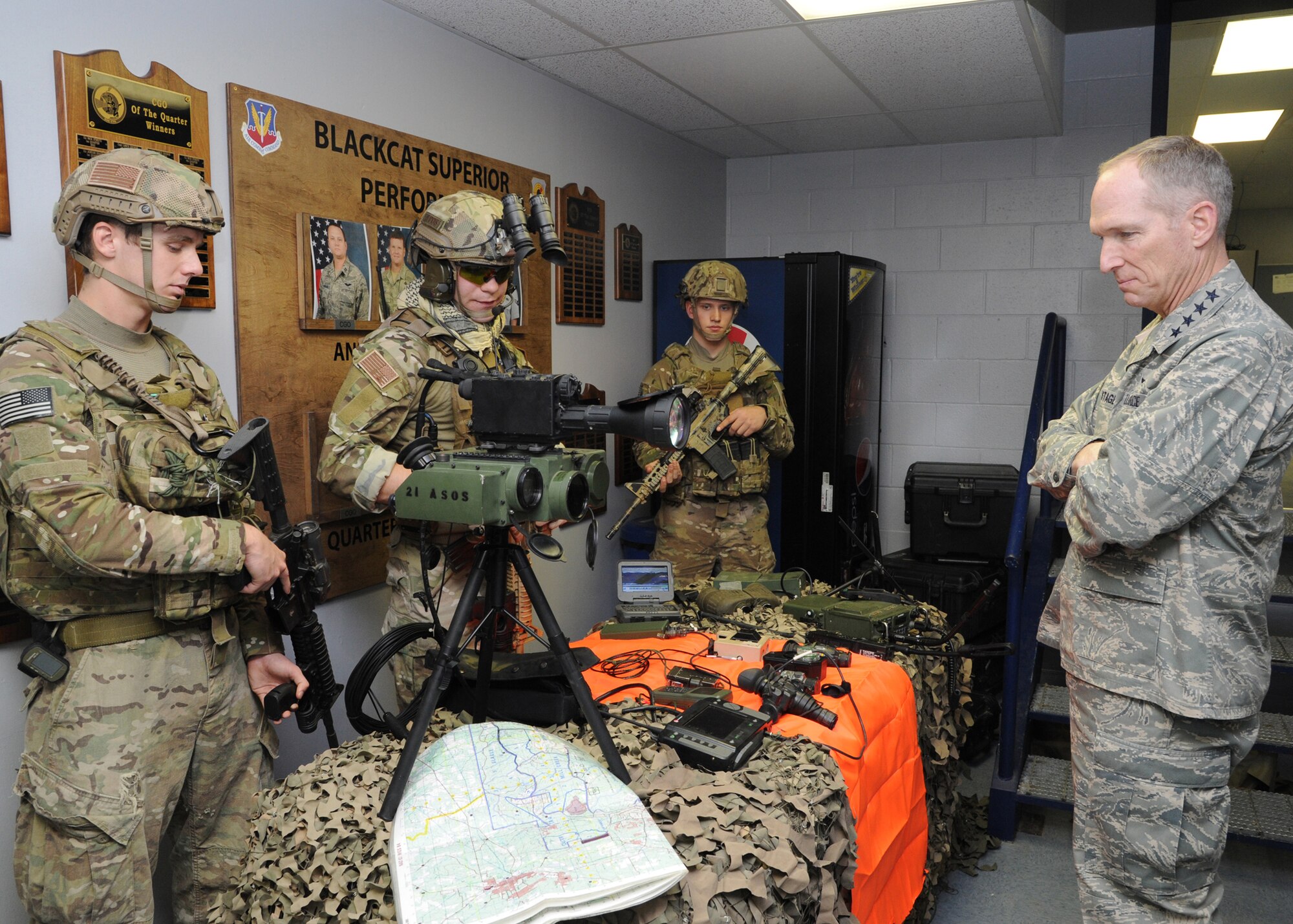 U.S. Air Force Gen. Mike Hostage, commander of Air Combat Command, speaks with tactical air control party Airmen at Fort Polk, La., Jan. 24. TACP Airmen showcased their equipment they use for daily operations and when dropping bombs. (U.S. Air Force photo/Airman 1st Class Joseph A. Pagán Jr./Released)